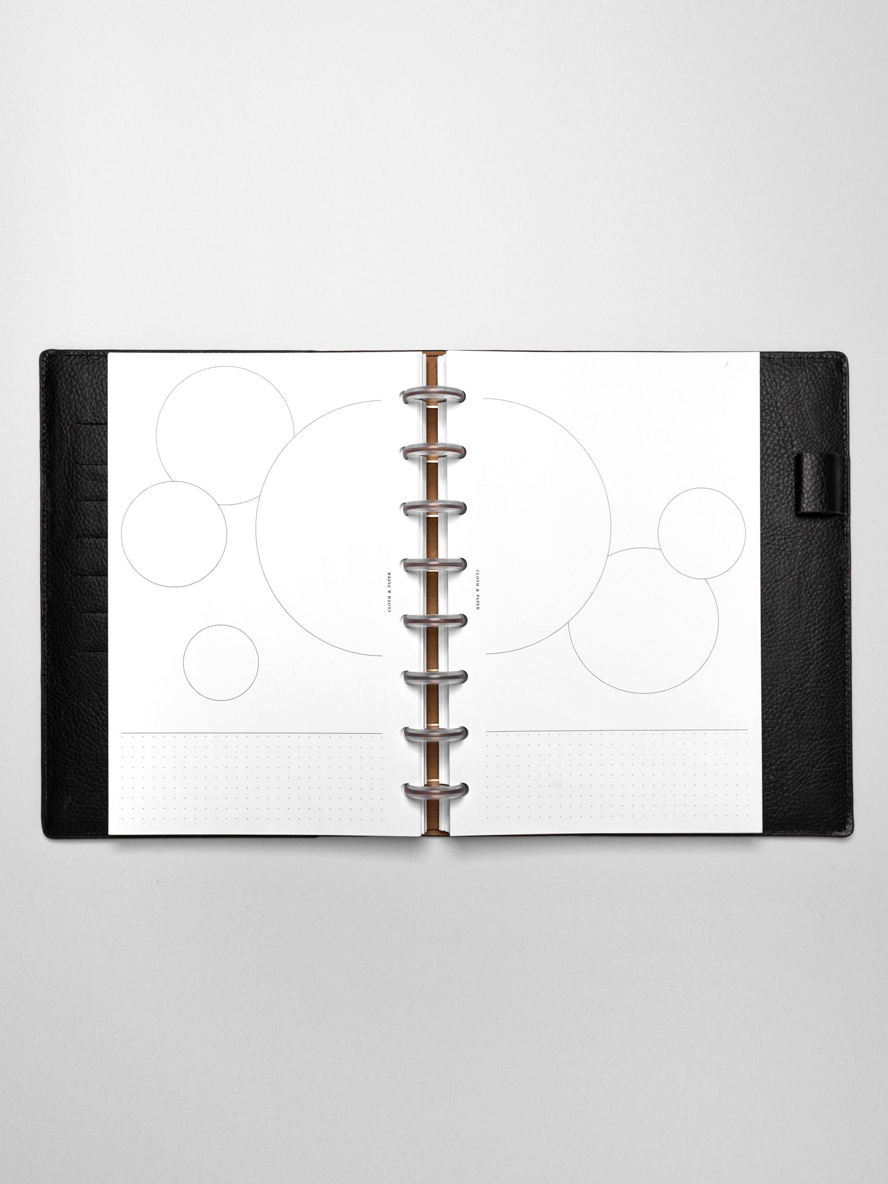 Insert in use inside a black leather planner.