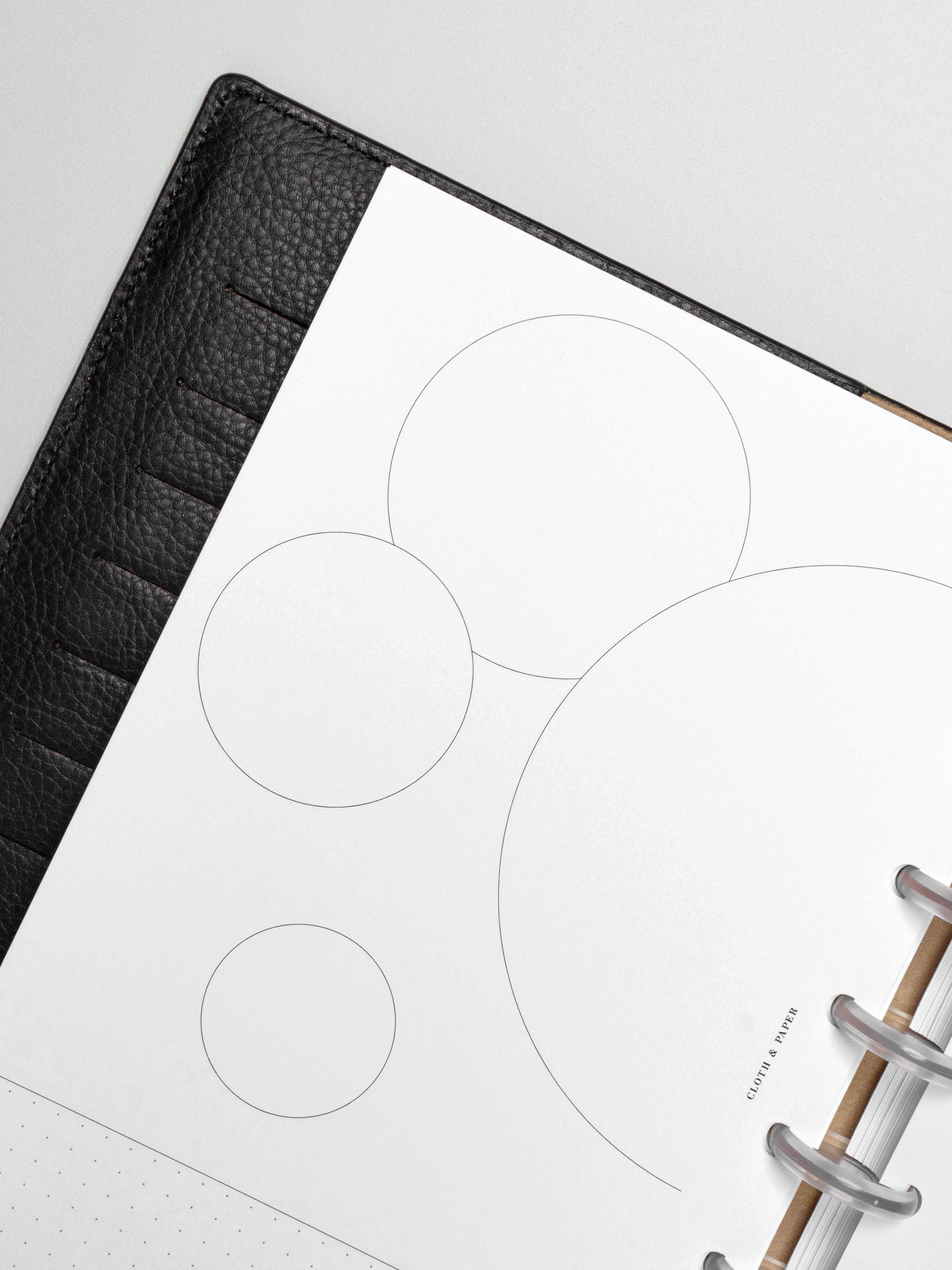 Insert in use inside a black leather planner.