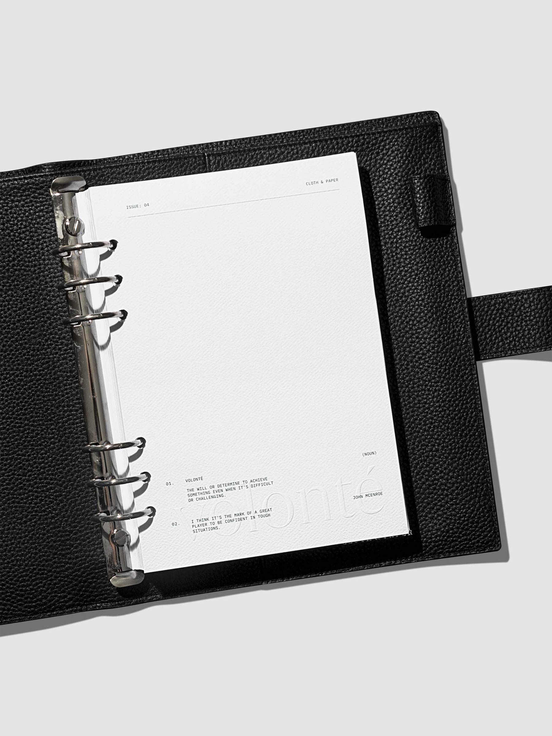 Dashboard shown in use inside a black leather agenda.