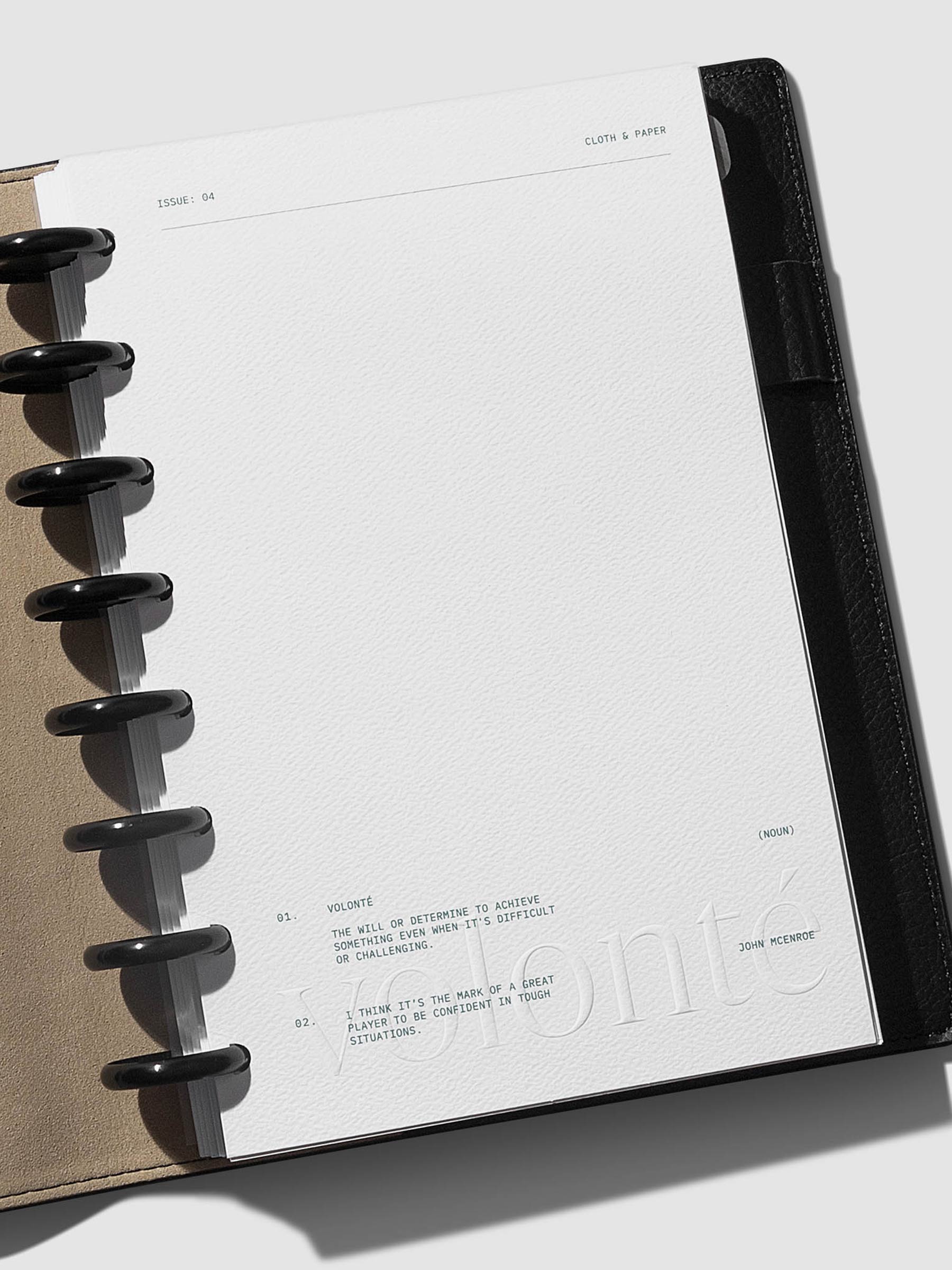 Dashboard shown in use inside a black leather agenda.