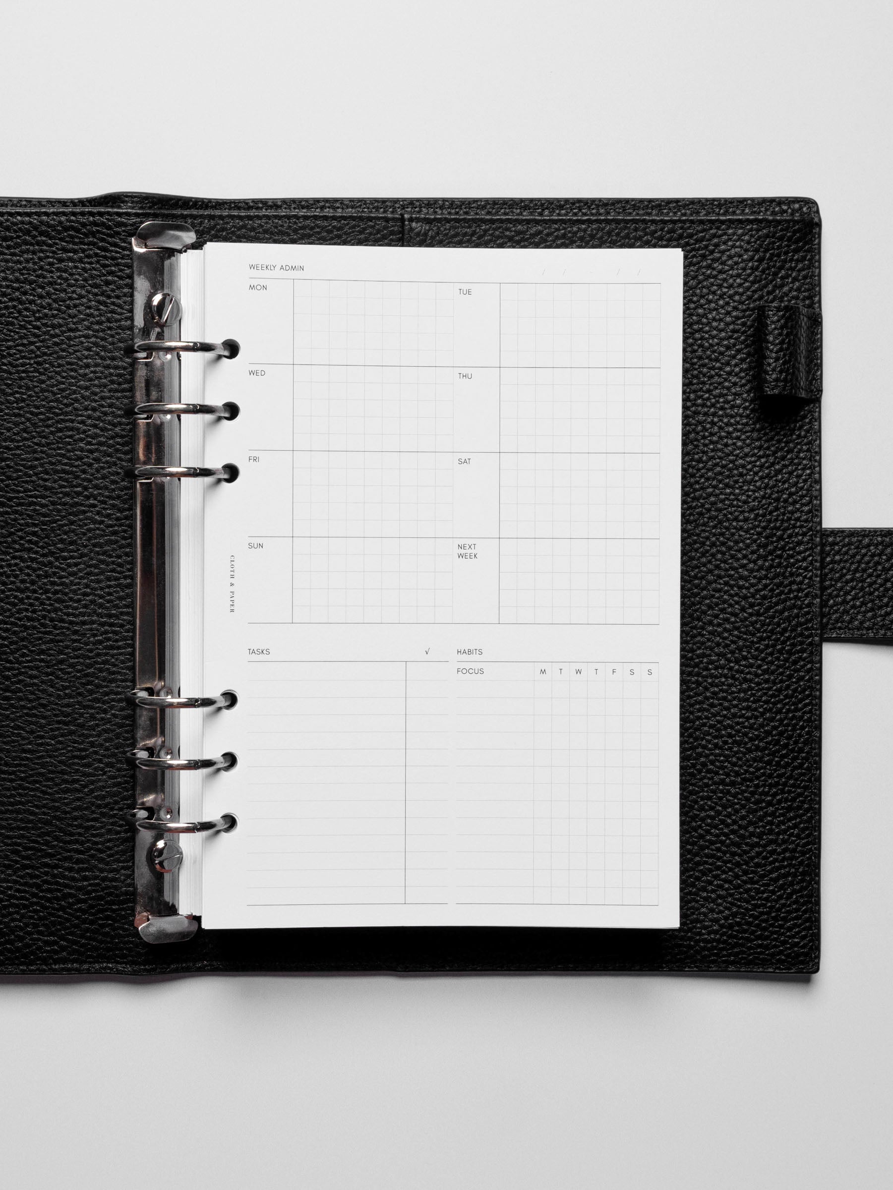 Insert in use inside a black leather planner.