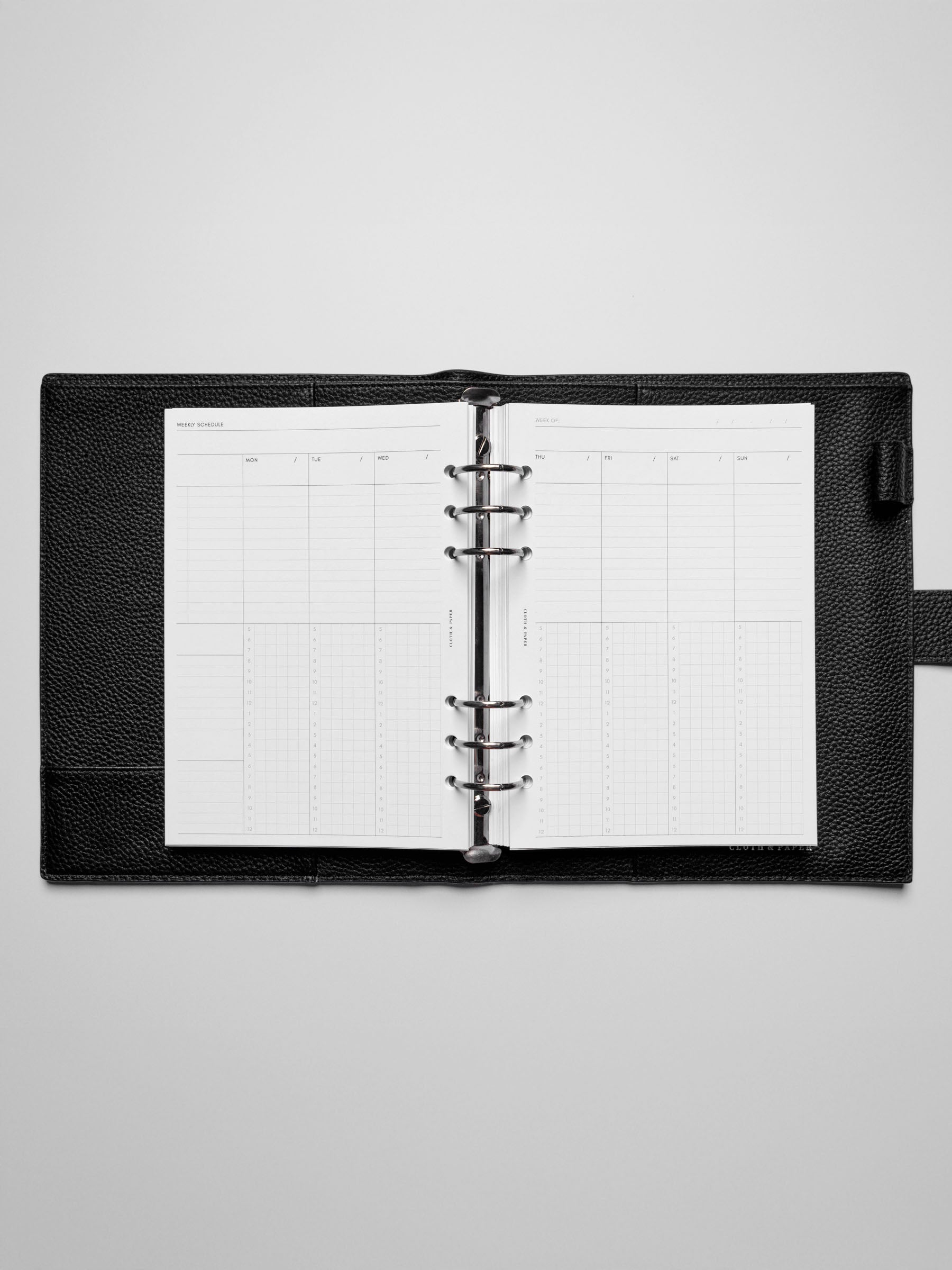 Insert in use inside a black leather planner.