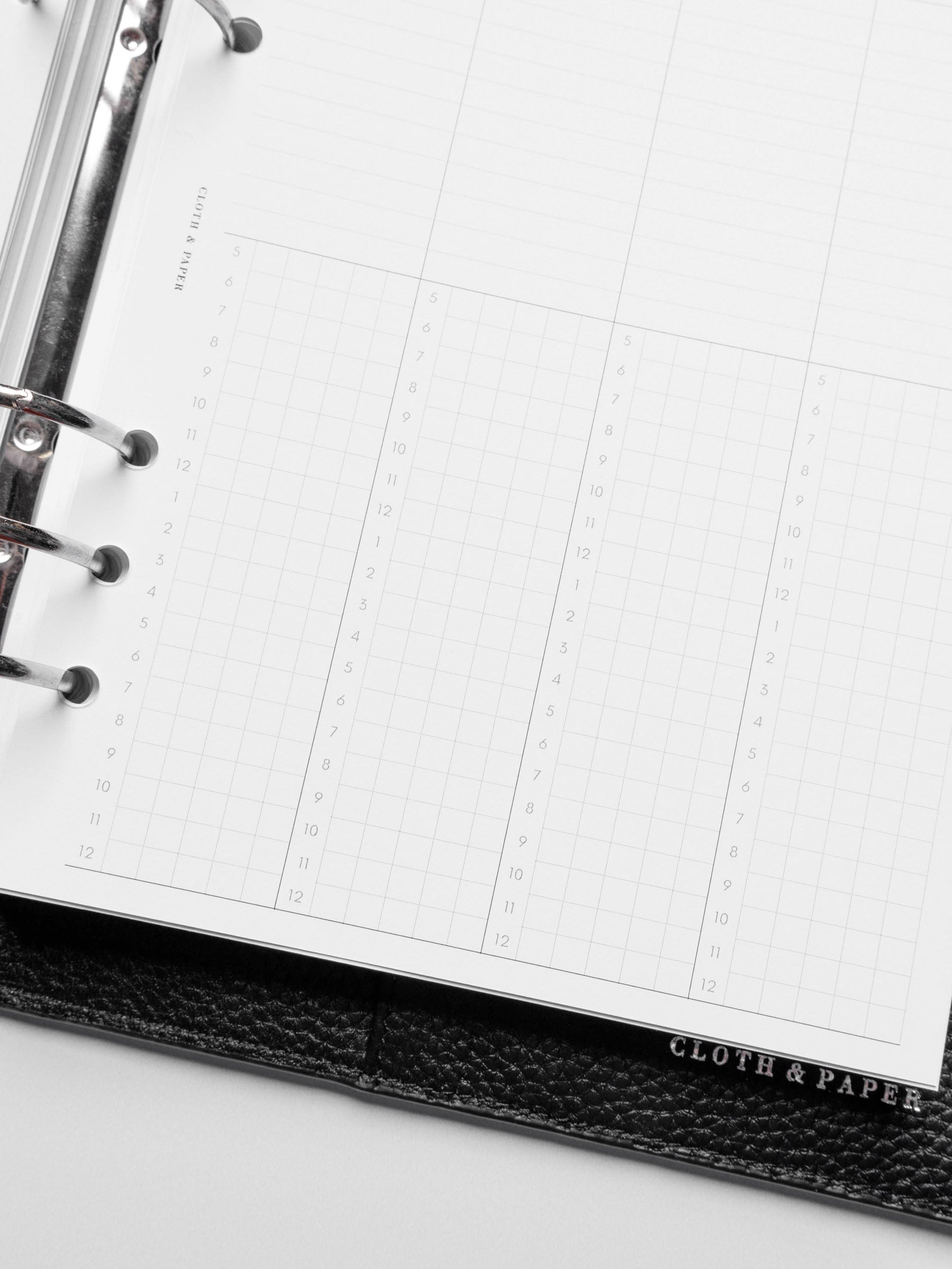 Insert in use inside a black leather planner.