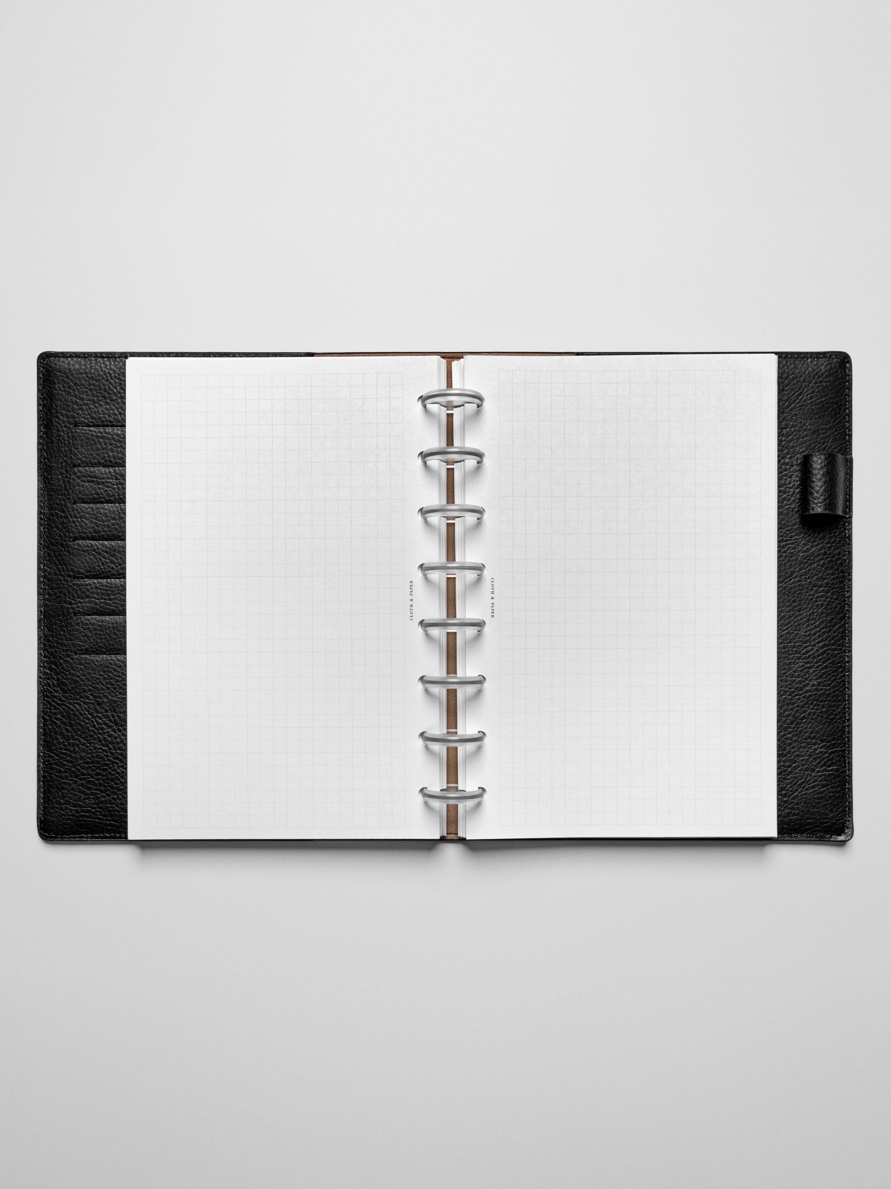Insert in use inside a black leather planner.