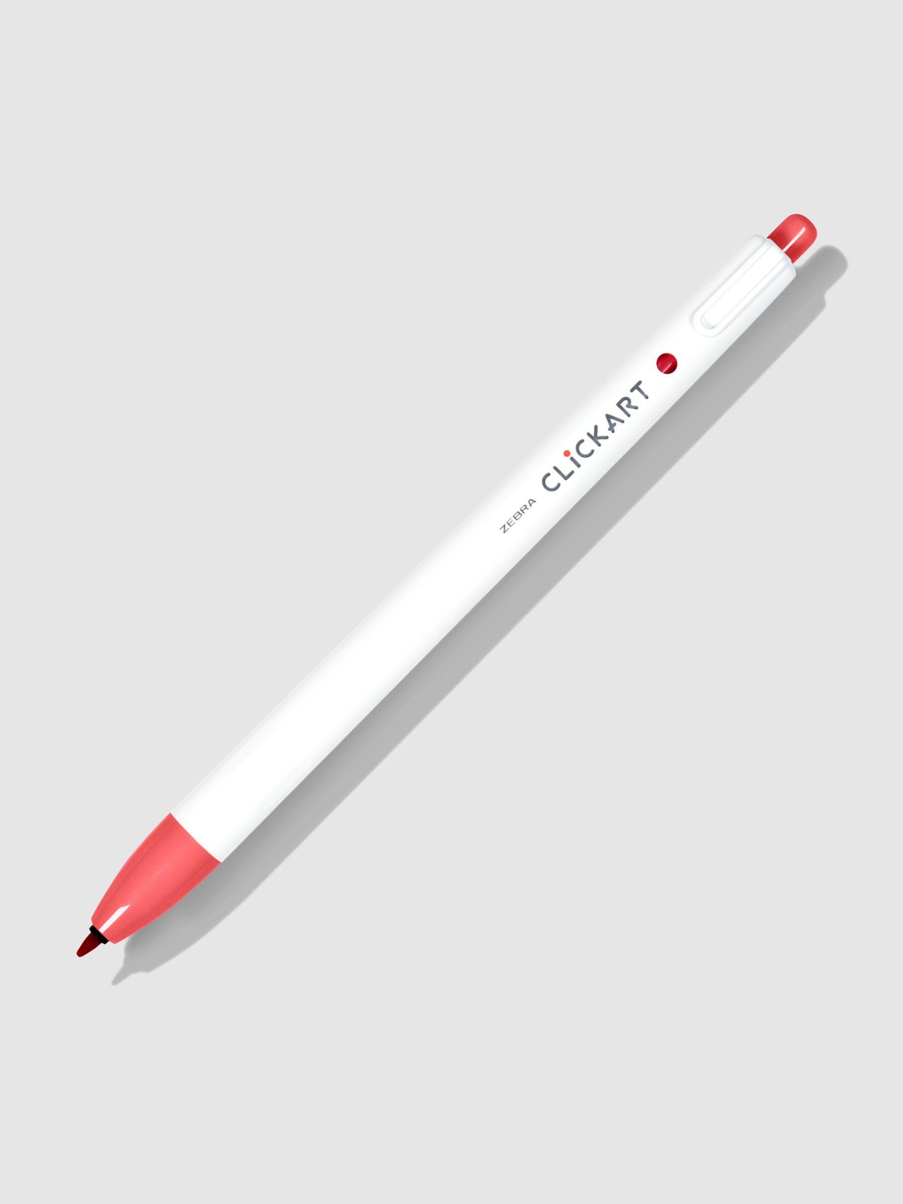 Zebra Clickart Marker, Baby Red, Cloth and Paper. Marker on a neutral background tilted to the right.