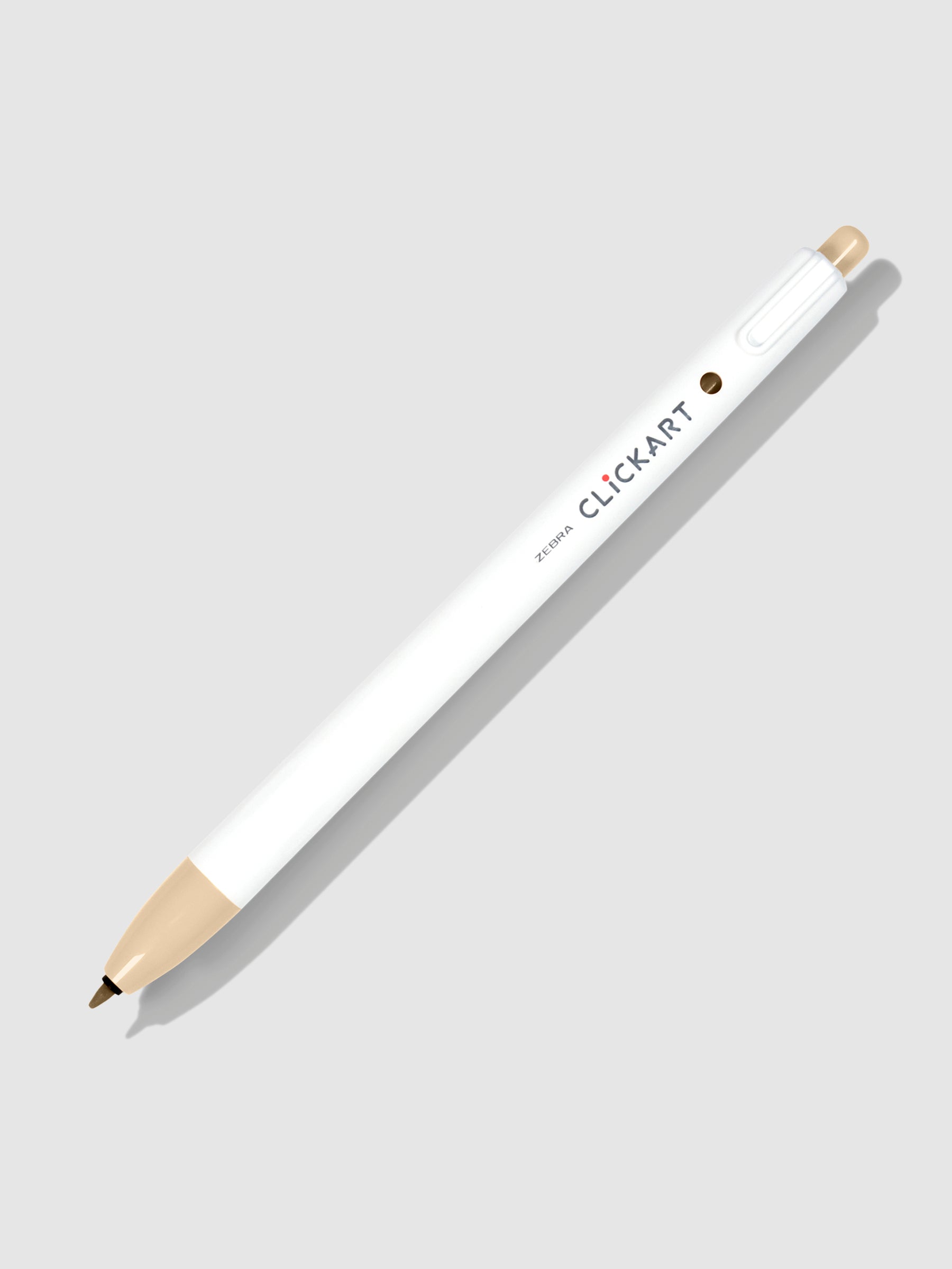 Zebra Clickart Marker, Pale Orange, Cloth and Paper. Marker on a neutral background tilted to the right.