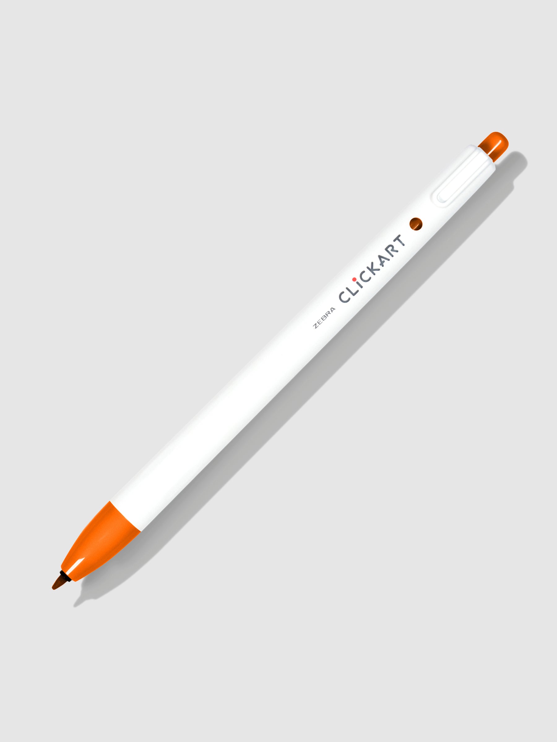 Zebra Clickart Marker, Red Orange, Cloth and Paper. Marker on a neutral background tilted to the right.