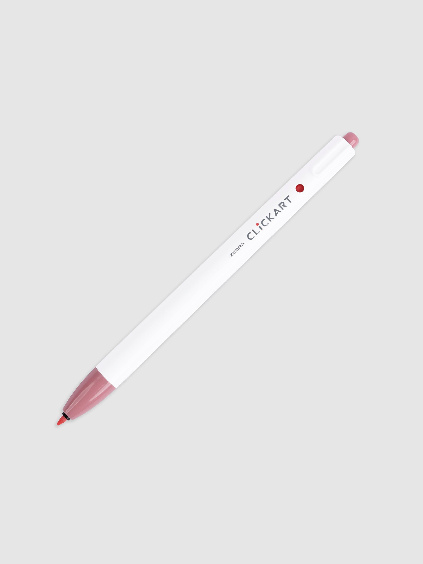 Pale Rose marker with nib exposed turned to the right on a neutral background.