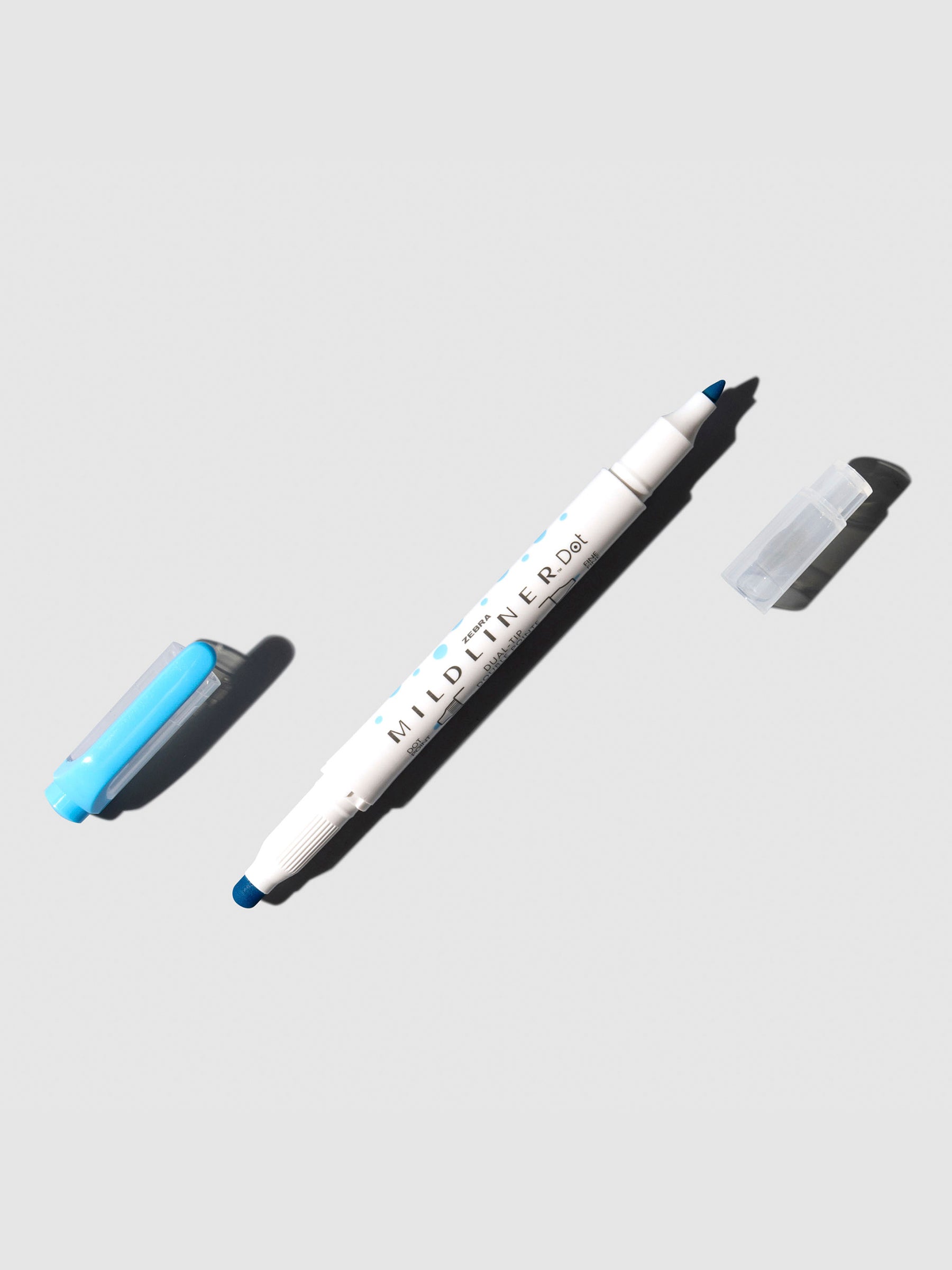 Mildliner highlighter displayed on a neutral background. Color shown is cyan.