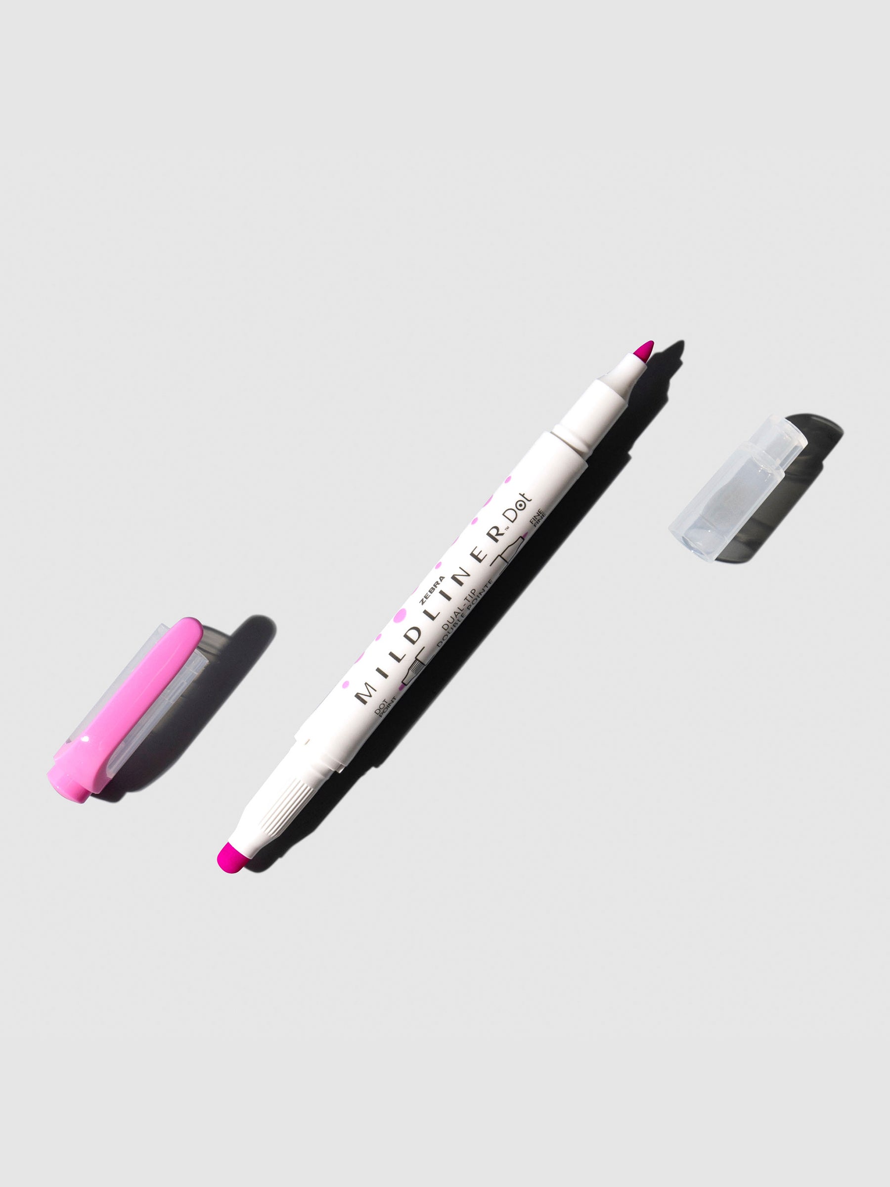 Mildliner highlighter displayed on a neutral background. Color shown is fuchsia.