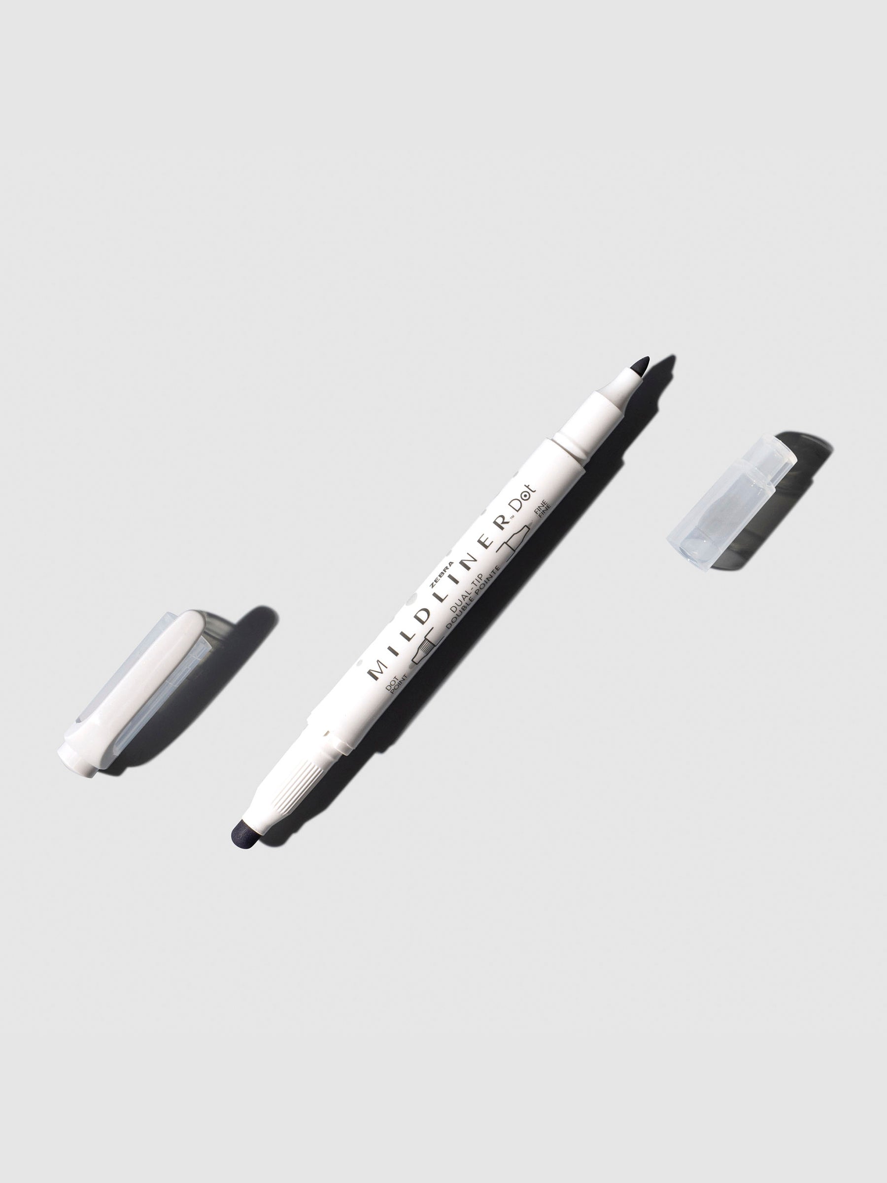 Mildliner highlighter displayed on a neutral background. Color shown is gray.