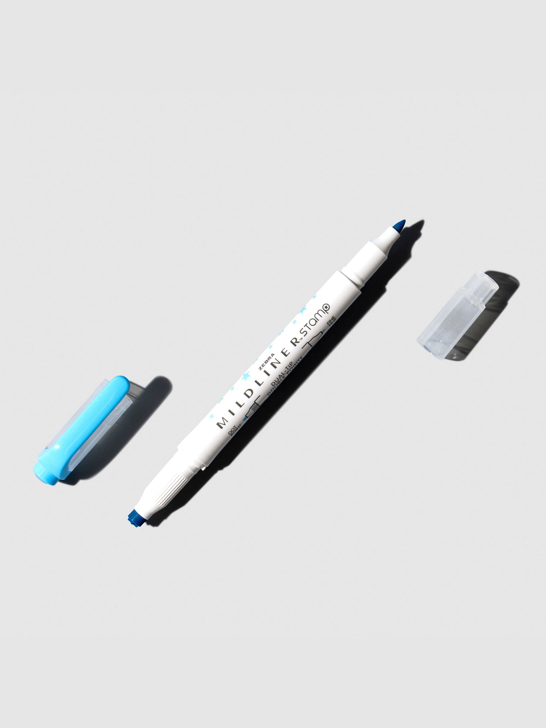 Cyan highlighter displayed on a neutral background.