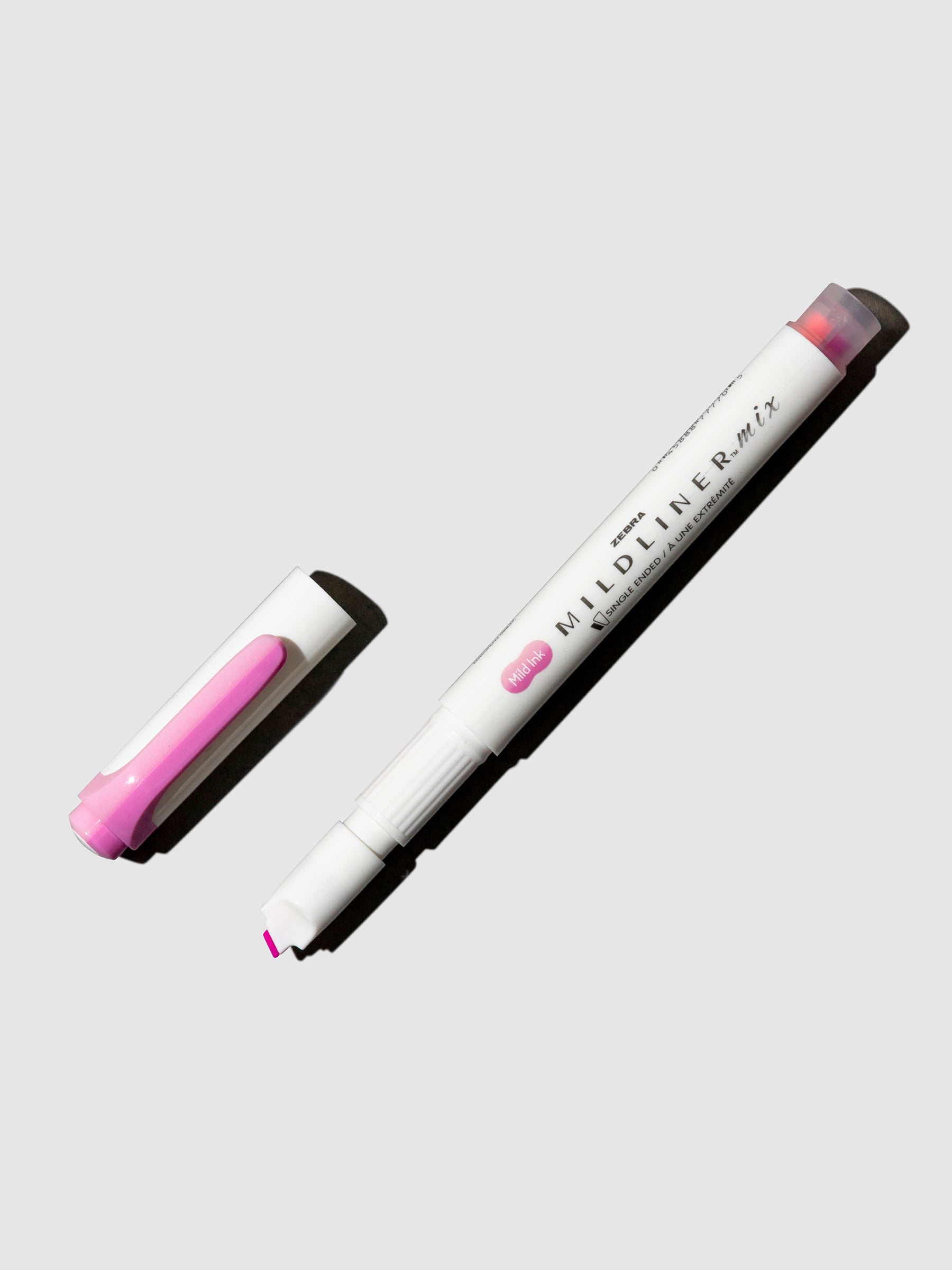 Highlighter shown on a neutral background. Color shown is Fuchsia + Pink.