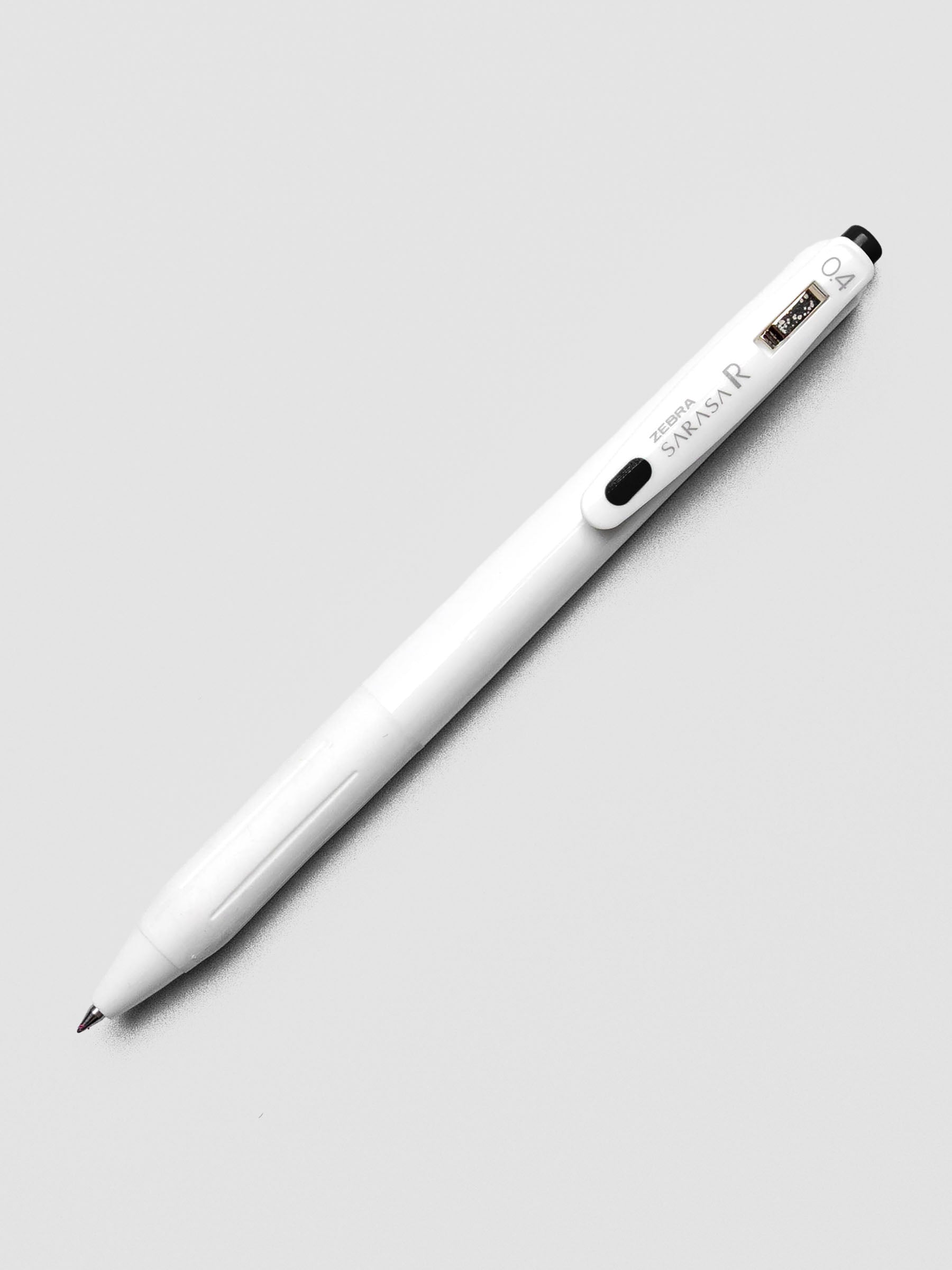 Zebra Sarasa R 0.4mm pen in black with matching clip, displayed on a white background.