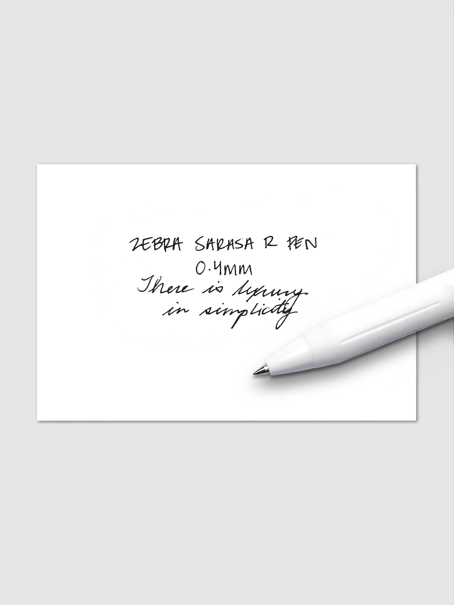 Writing sample using Zebra Sarasa R 0.4mm pen in black ink on white paper.