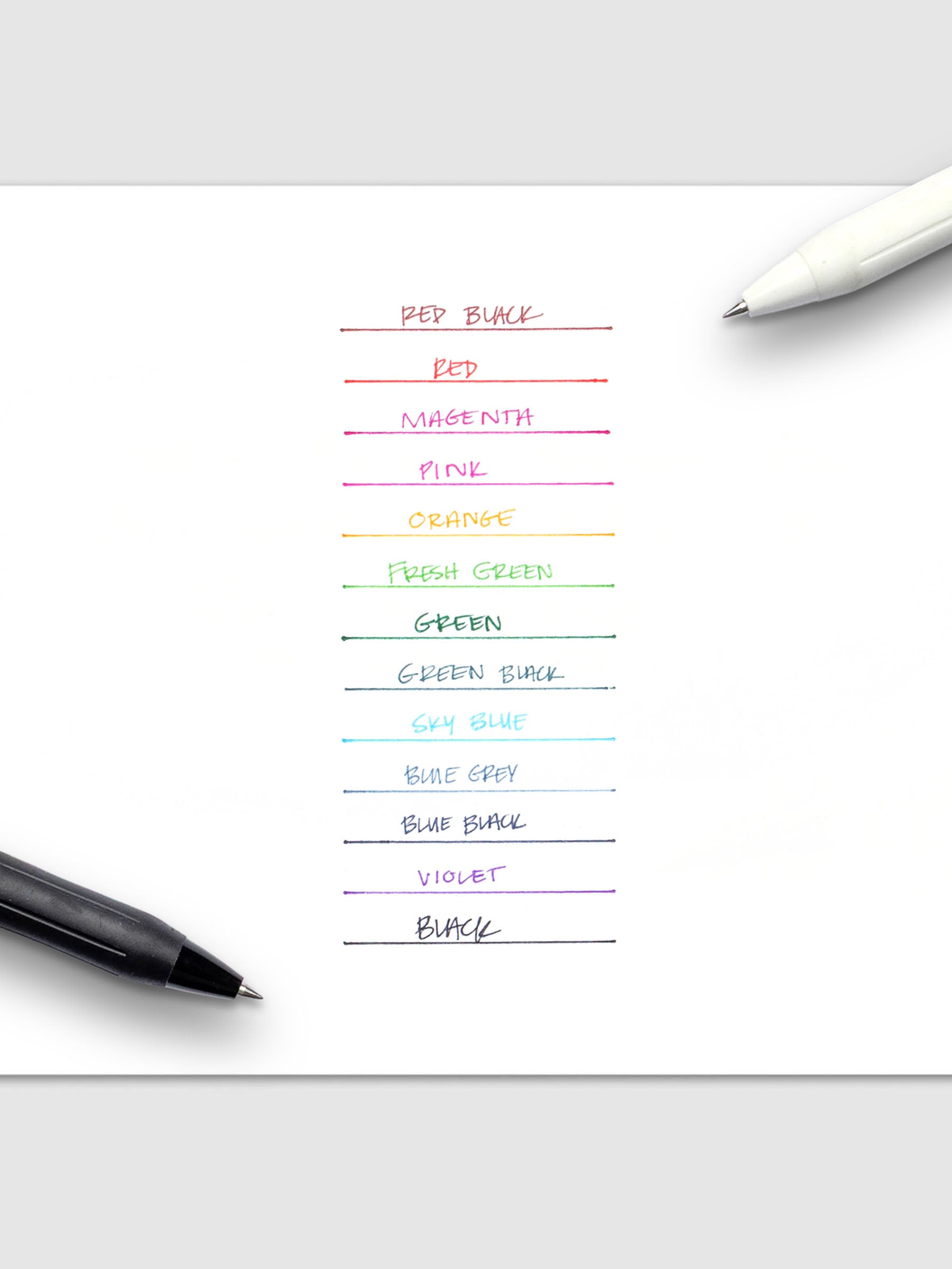 Writing samples in black, pink, green, orange, blue, red, violet, and magenta from Zebra Sarasa R 0.4mm pens on white paper.
