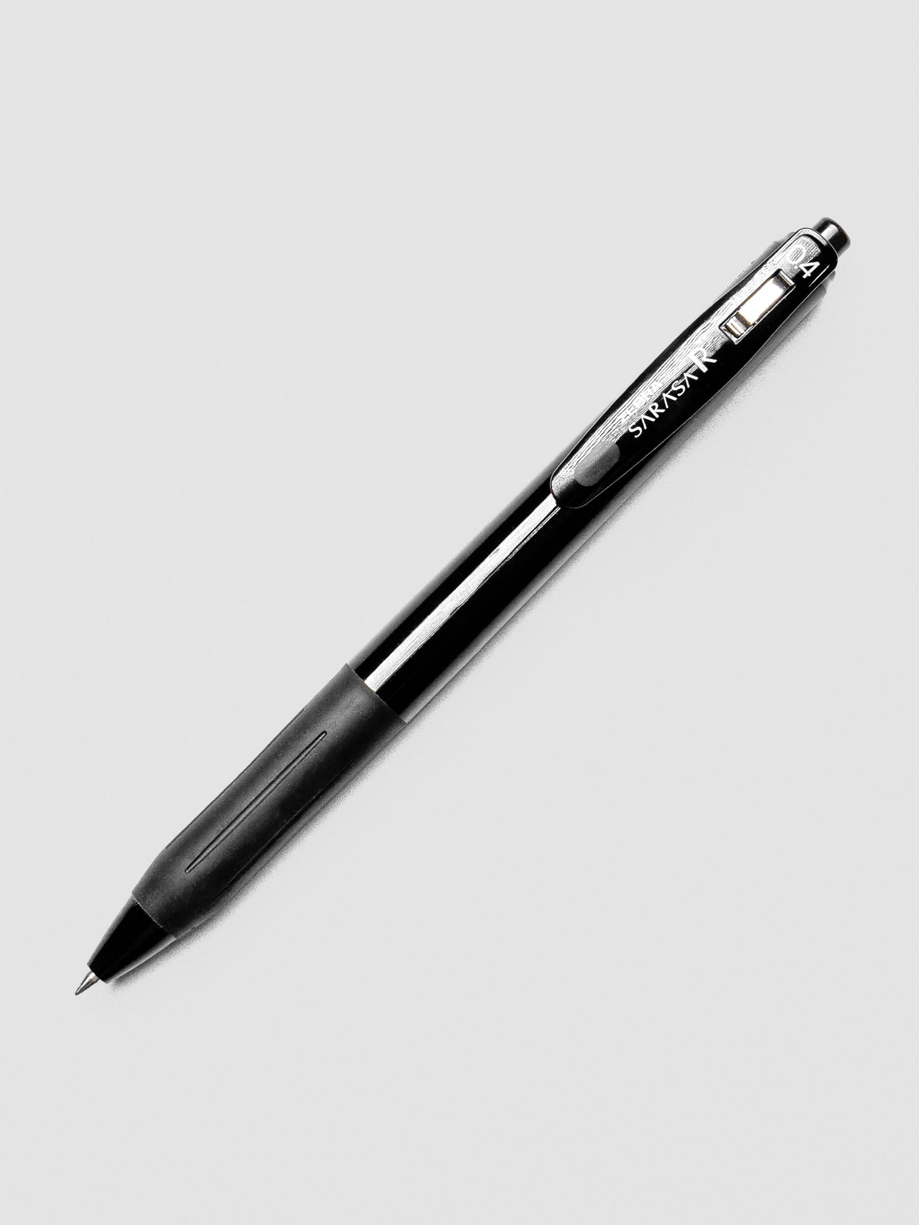Zebra Sarasa R 0.4mm pen with solid black body and black clip, displayed on a white background.