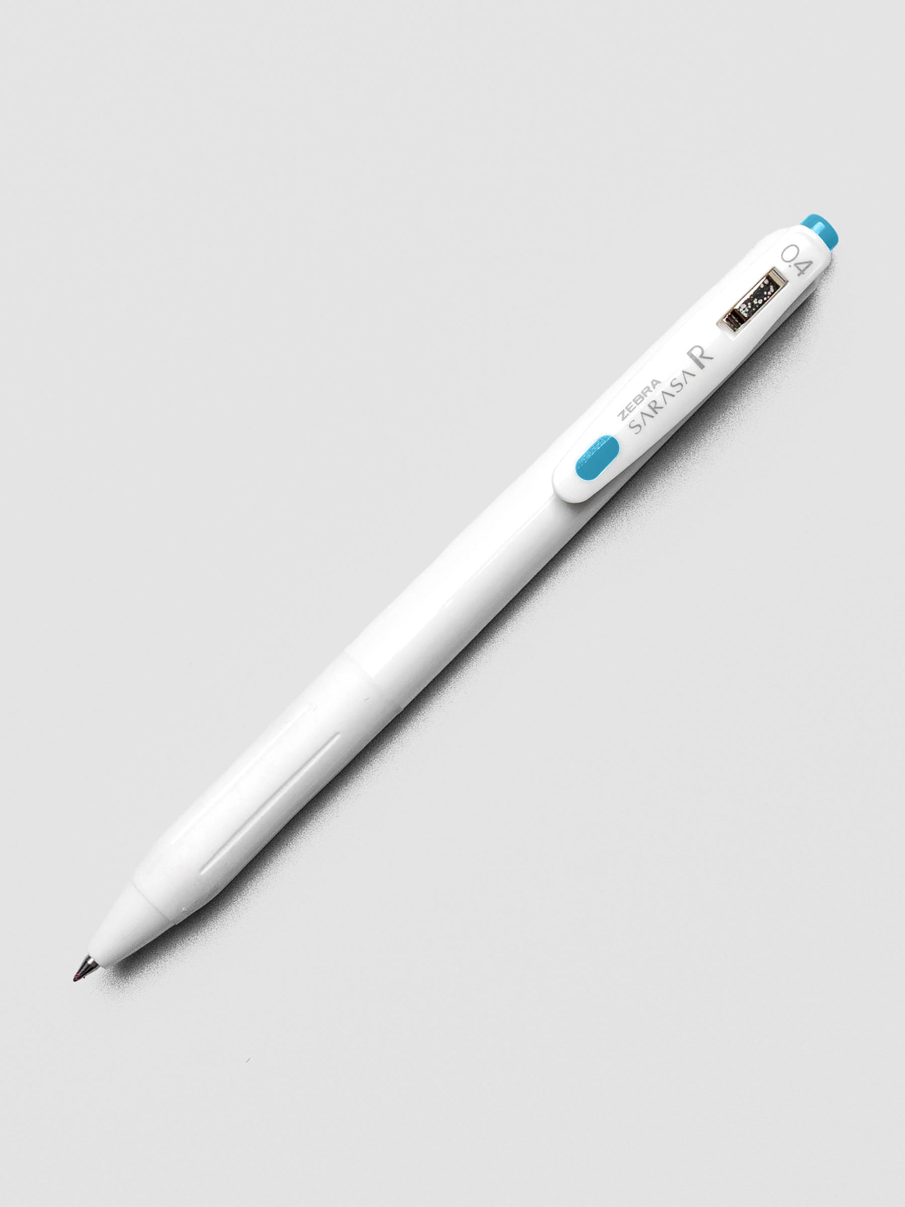 Zebra Sarasa R 0.4mm pen in sky blue ink with matching clip, shown on a white background.