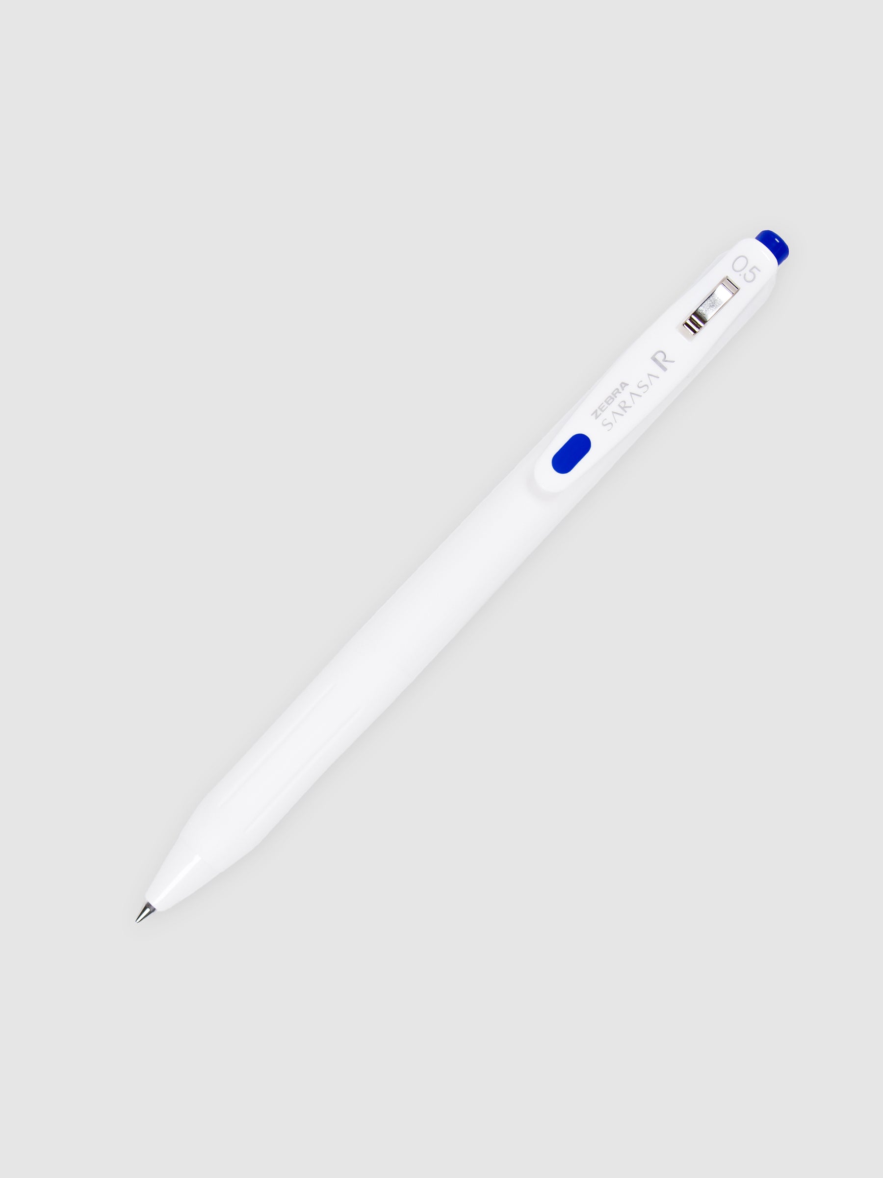 Zebra Sarasa R Pen, 0.5 mm, Blue, Cloth and Paper. Pen with nib exposed turned to the right against a neutral background.