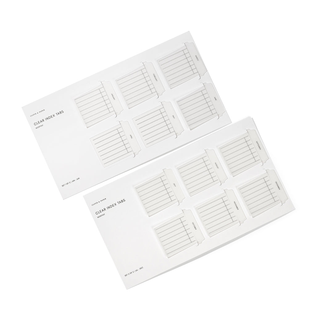 Monthly style Clear Index Tabs in their packaging displayed on a white background.