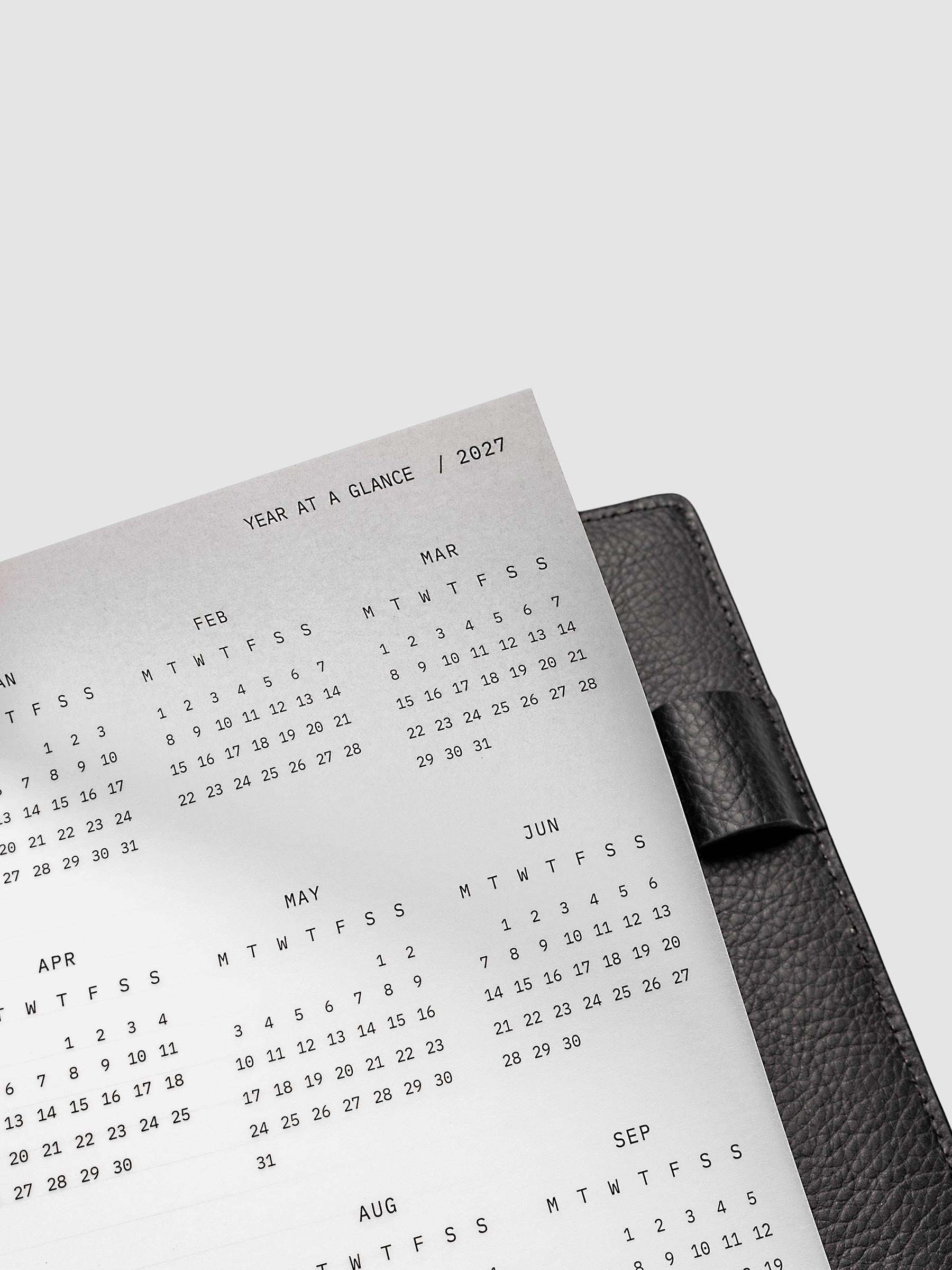 2027 Year At A Glance Dashboard Monday Start, A5 6-Ring Punch, close-up of the bottom of the vellum dashboard showing the final months of the 2027 year-at-a-glance calendar