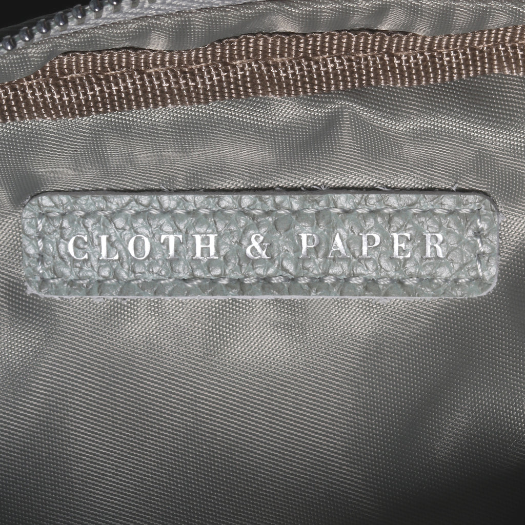 Closeup of Cloth and Paper logo inside Ristretto pouch. 