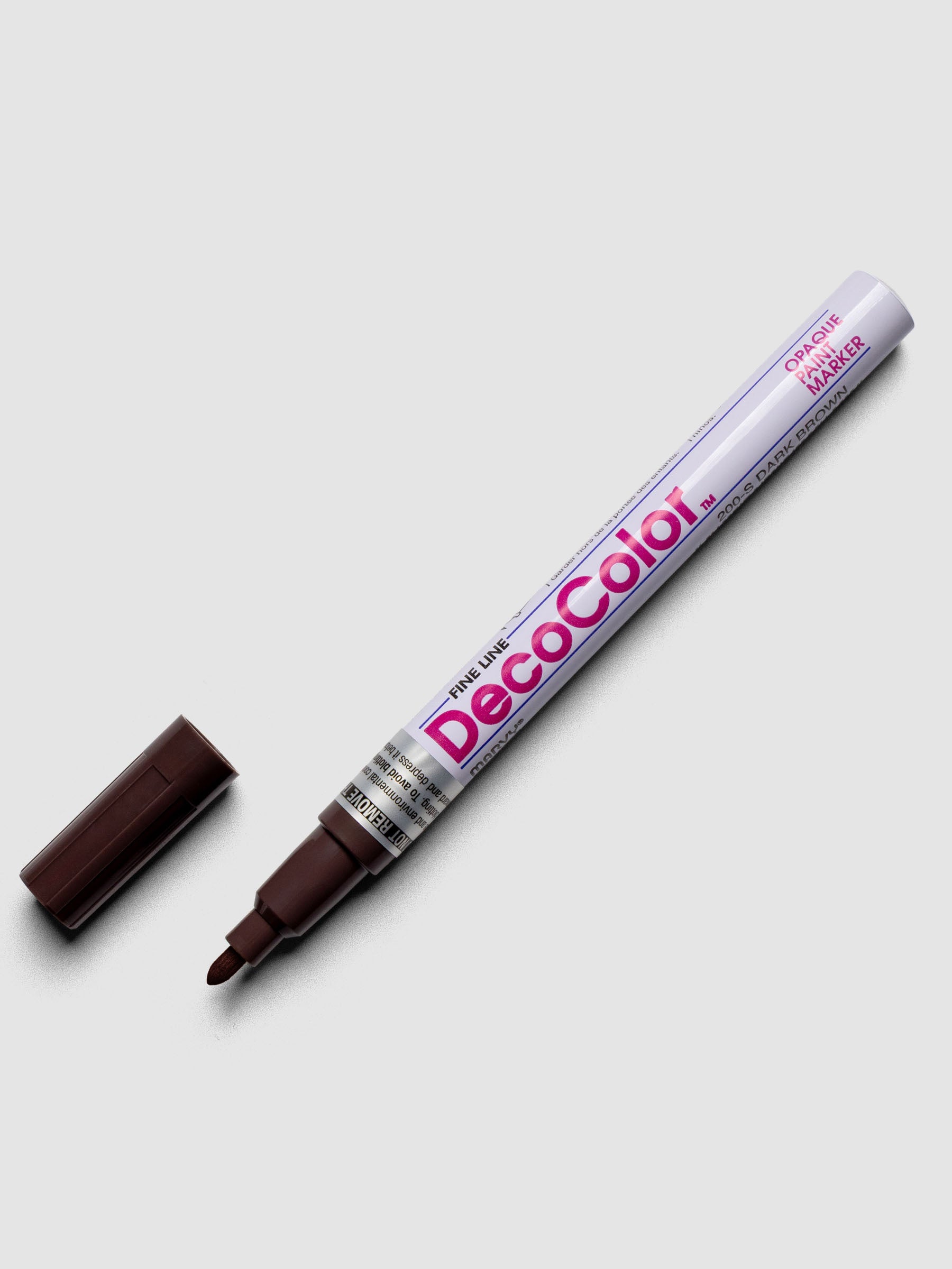 Dark Brown DecoColor paint marker in fine shown with cap removed.