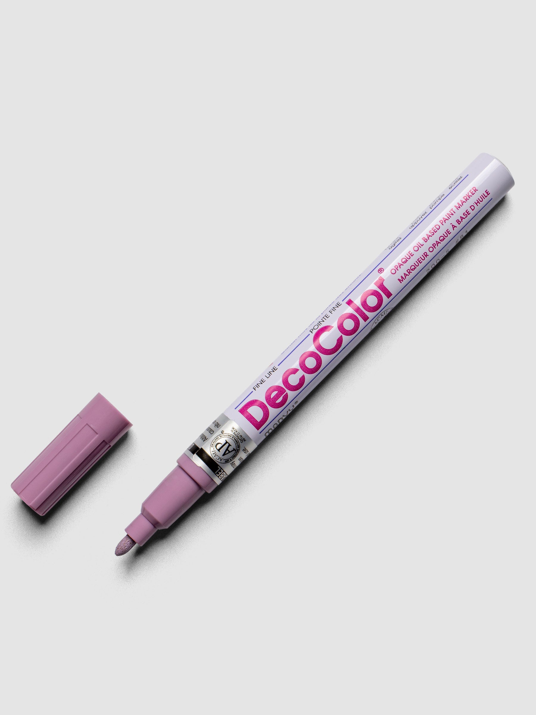 Pale Mauve DecoColor paint marker in fine shown with cap removed.