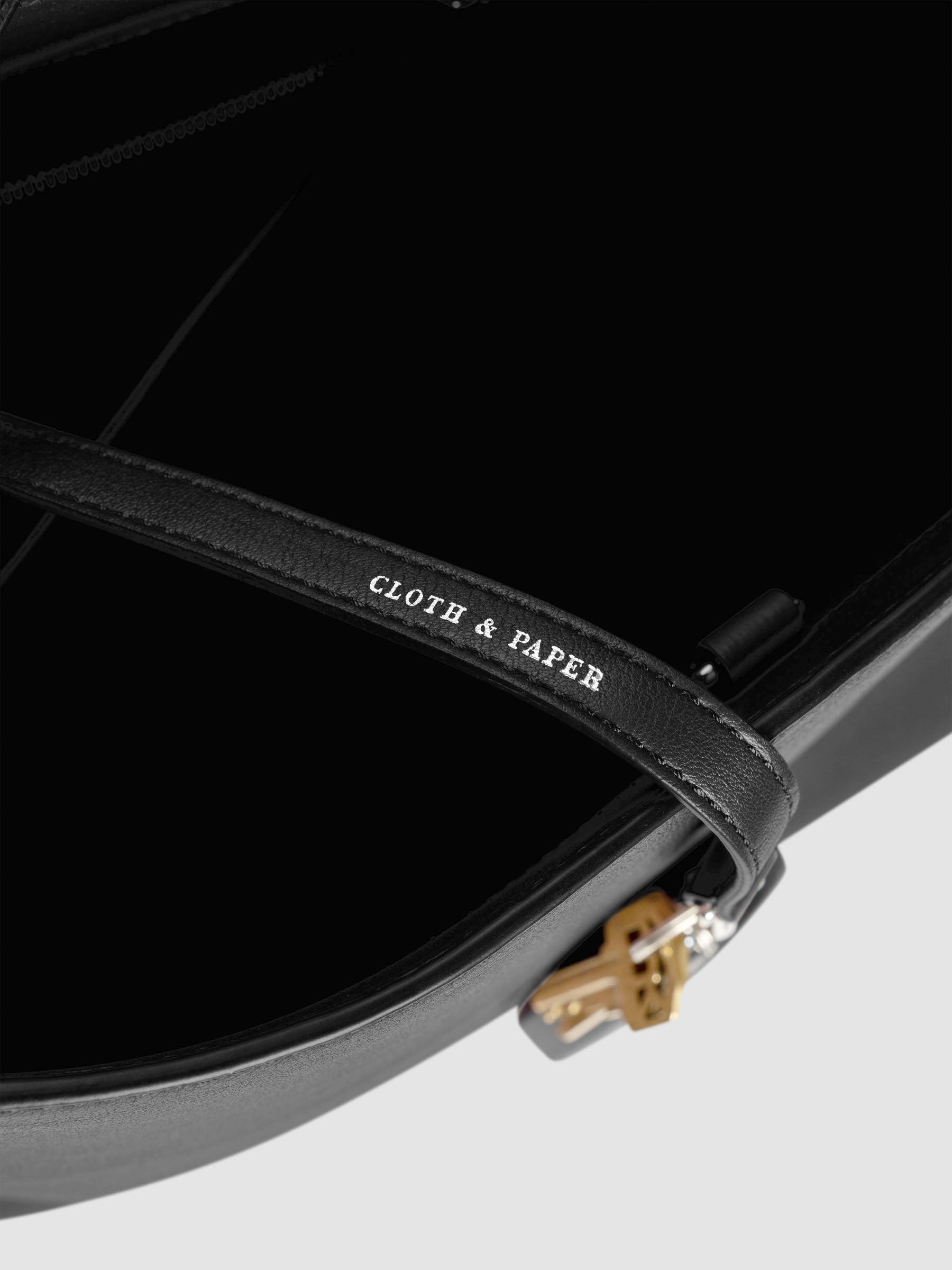 Detail view of Cloth & Paper logo foil on The Metro Tote in the color Padrillo.