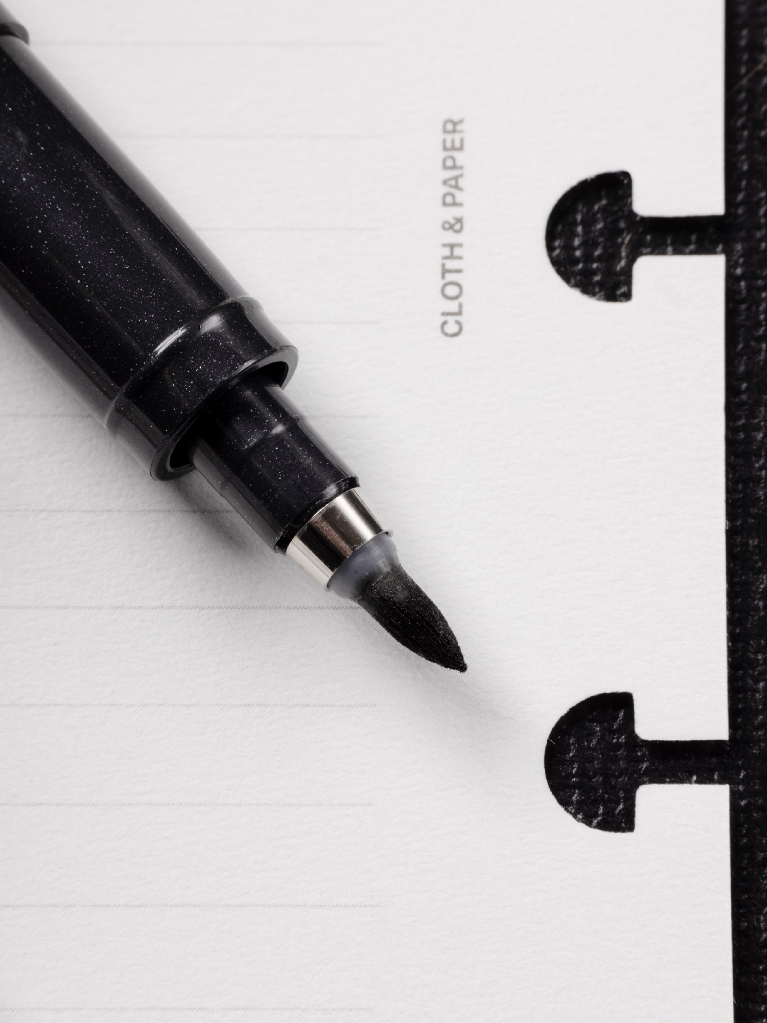 Black barrel Zebra Fude Brush Pen with medium nib showing the tip close up