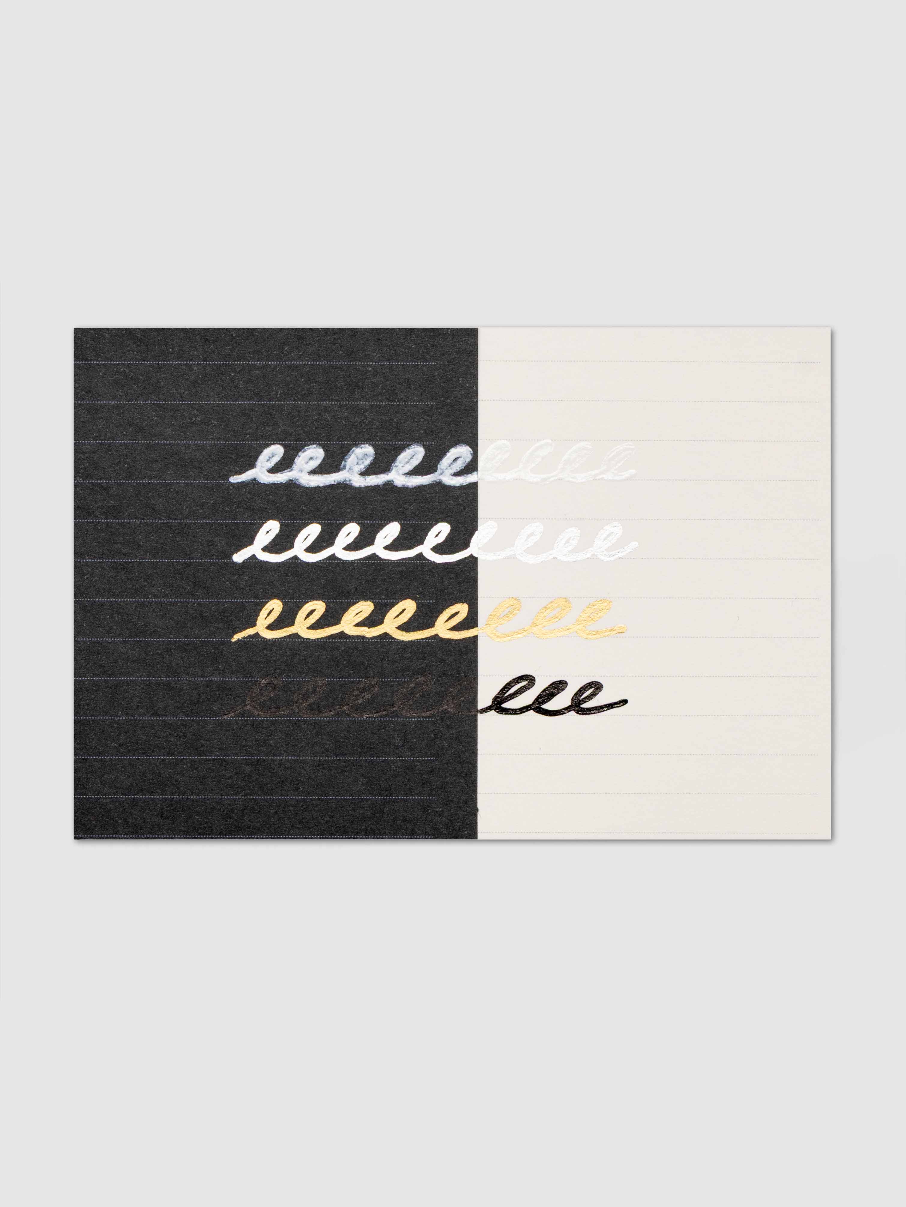 DecoColor pen test sheet shown on black and cream paper