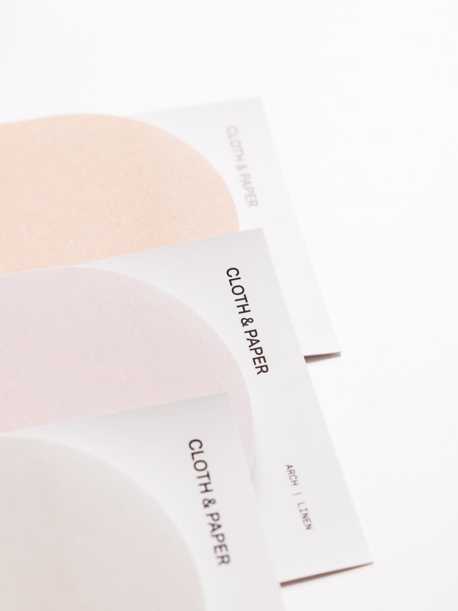 Three colors of Arched Sticky Notes shown stacked | Cloth & Paper