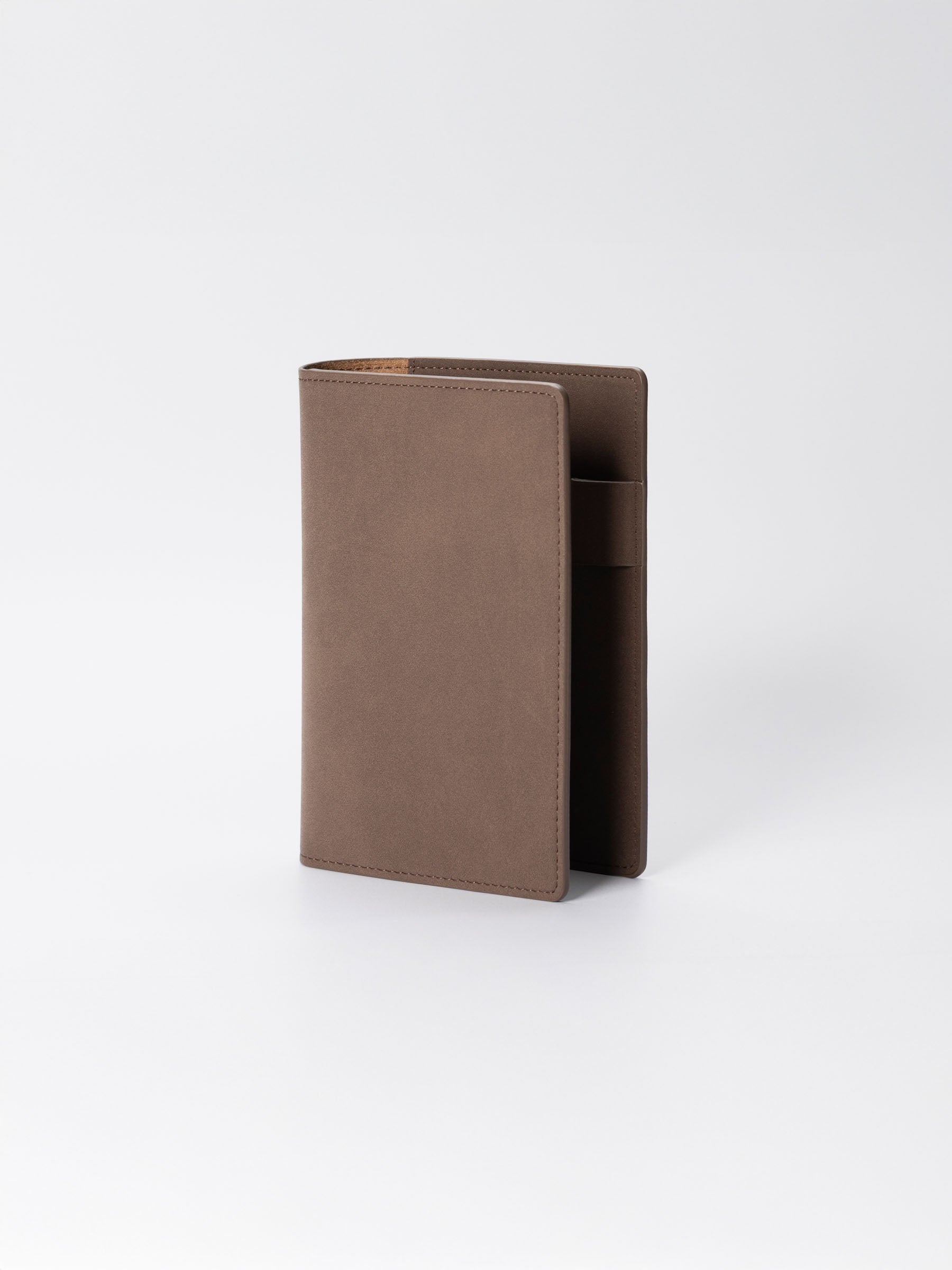 CP Petite folio displayed on a neutral background. Color shown is Espresso.
