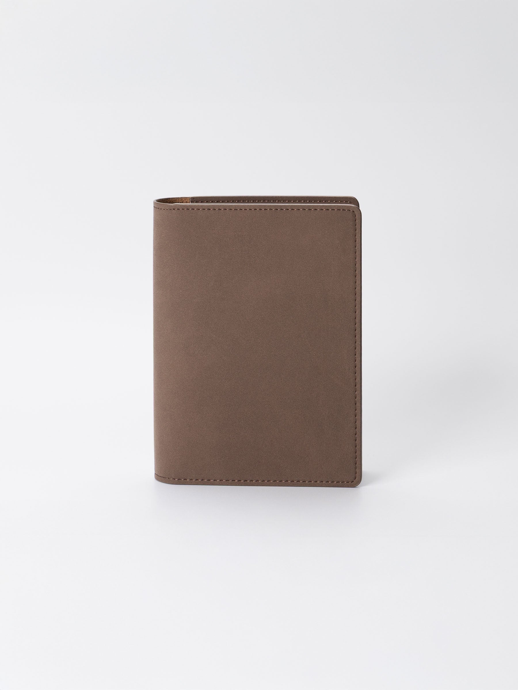 CP Petite folio displayed on a neutral background. Color shown is Espresso.