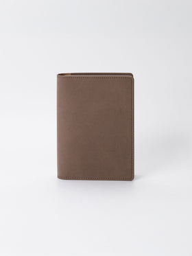 CP Petite folio displayed on a neutral background. Color shown is Espresso.