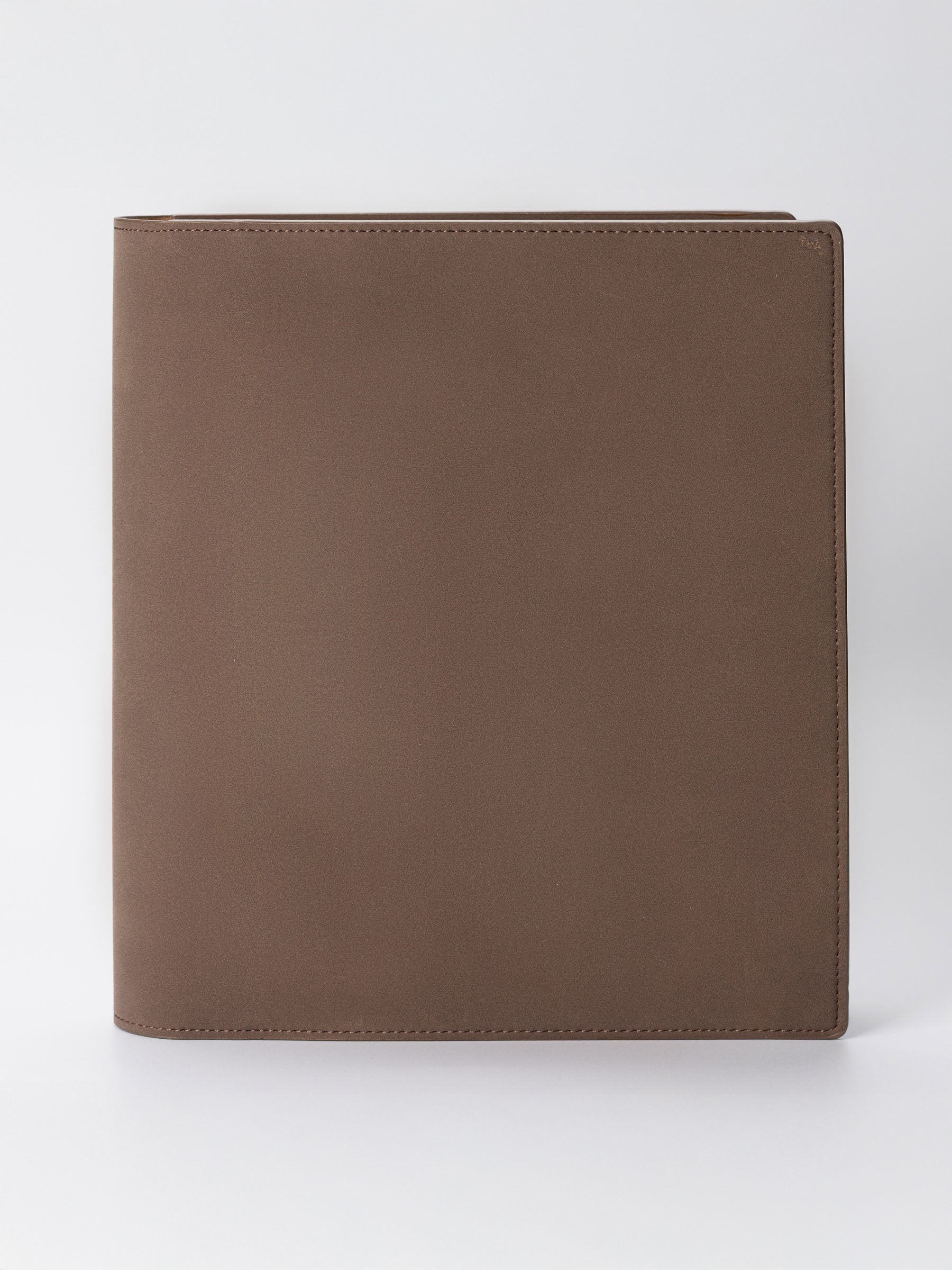 Folio displayed on a neutral background. Color shown is Espresso.