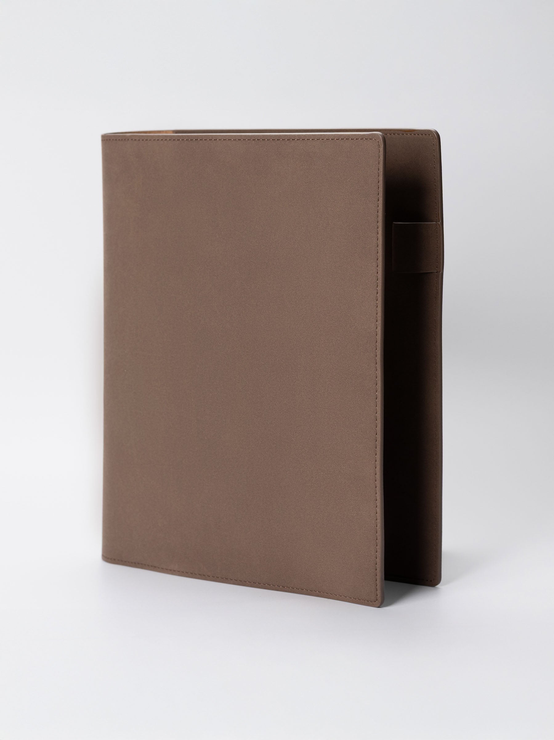 Folio displayed on a neutral background. Color shown is Espresso.