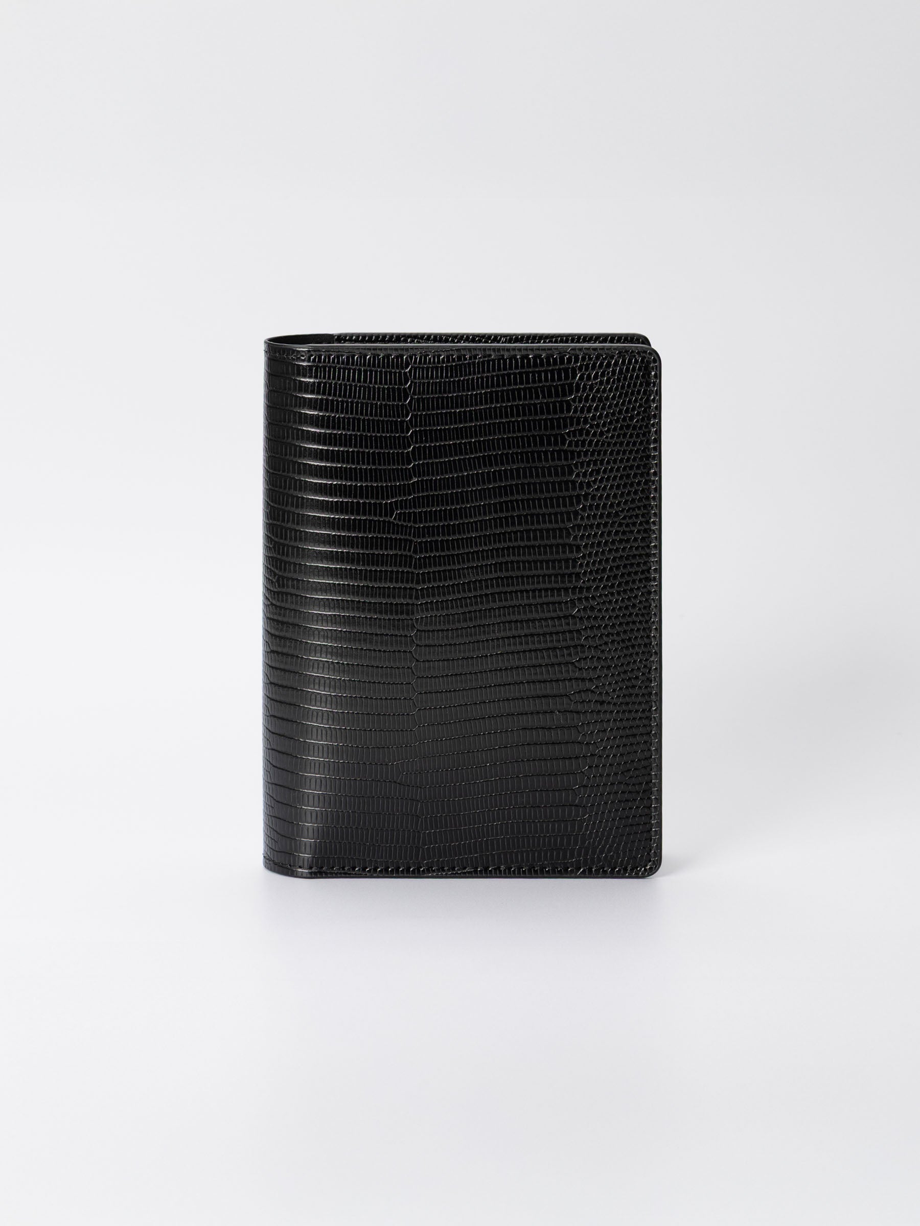 Folio displayed on a neutral background. Color shown is black. Size shown is CP Petite.