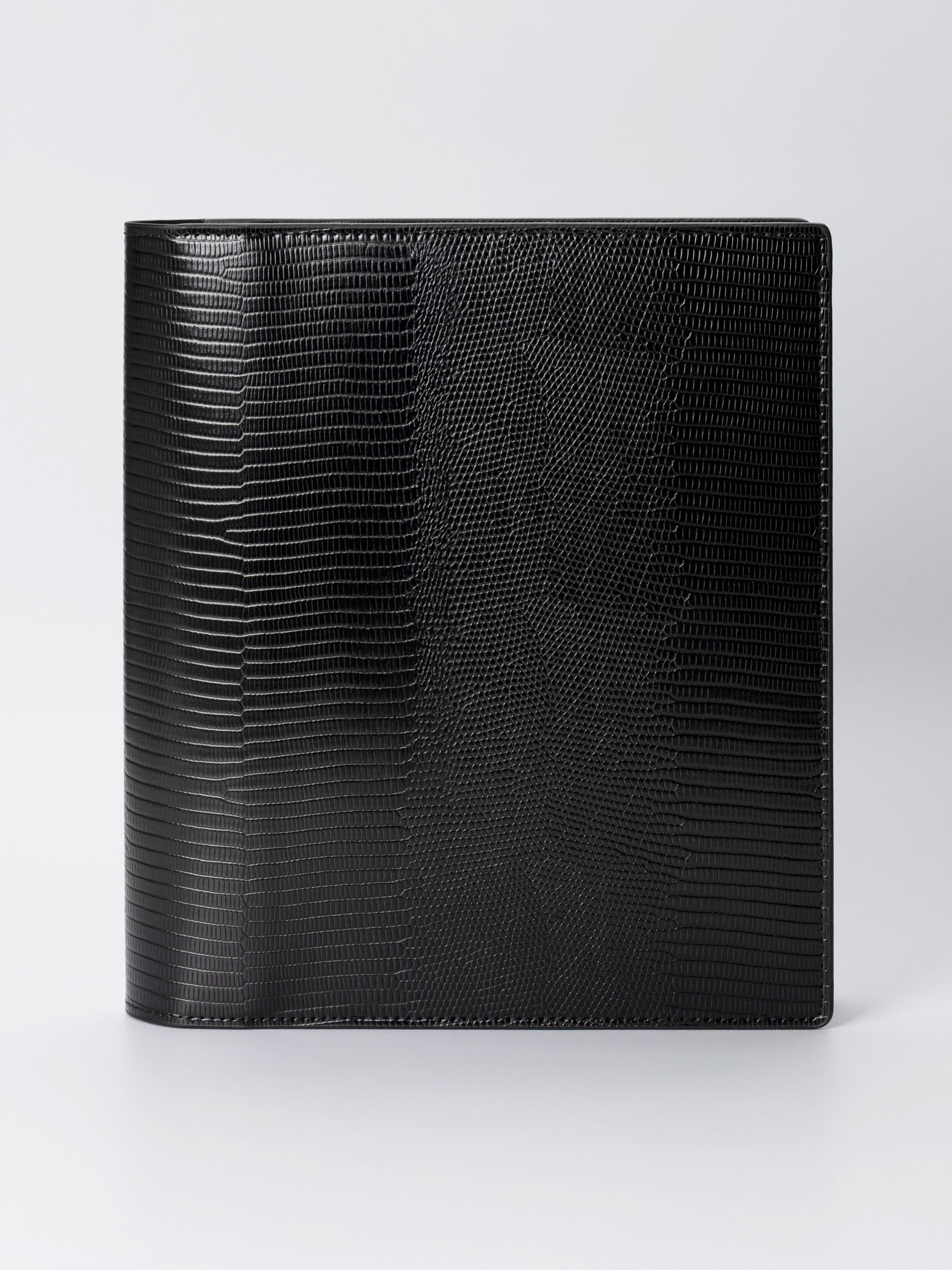 Folio displayed on a neutral background. Color shown is black. Size shown is HP Classic.