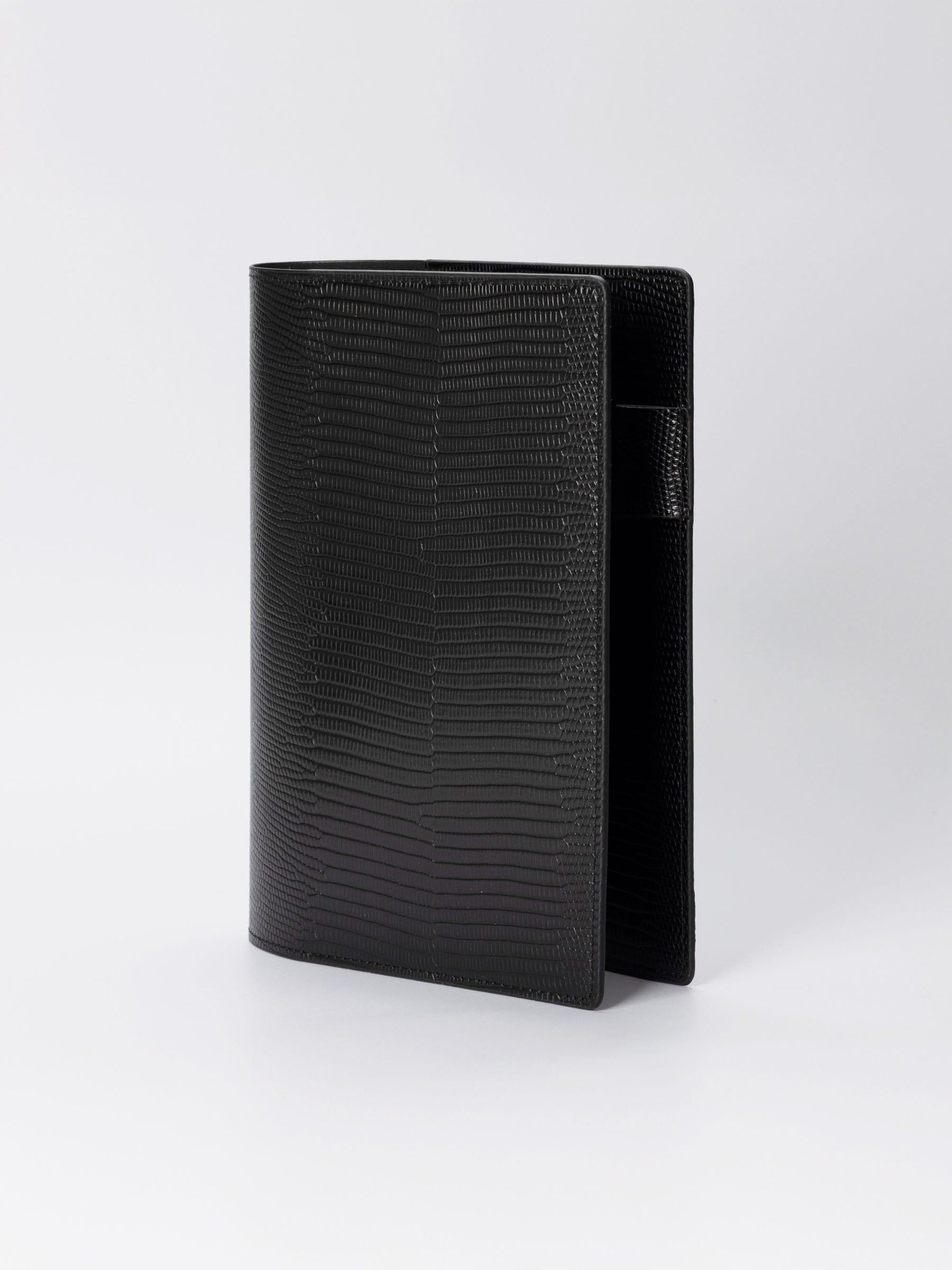 Folio displayed on a neutral background. Color shown is black. Size shown is Large.