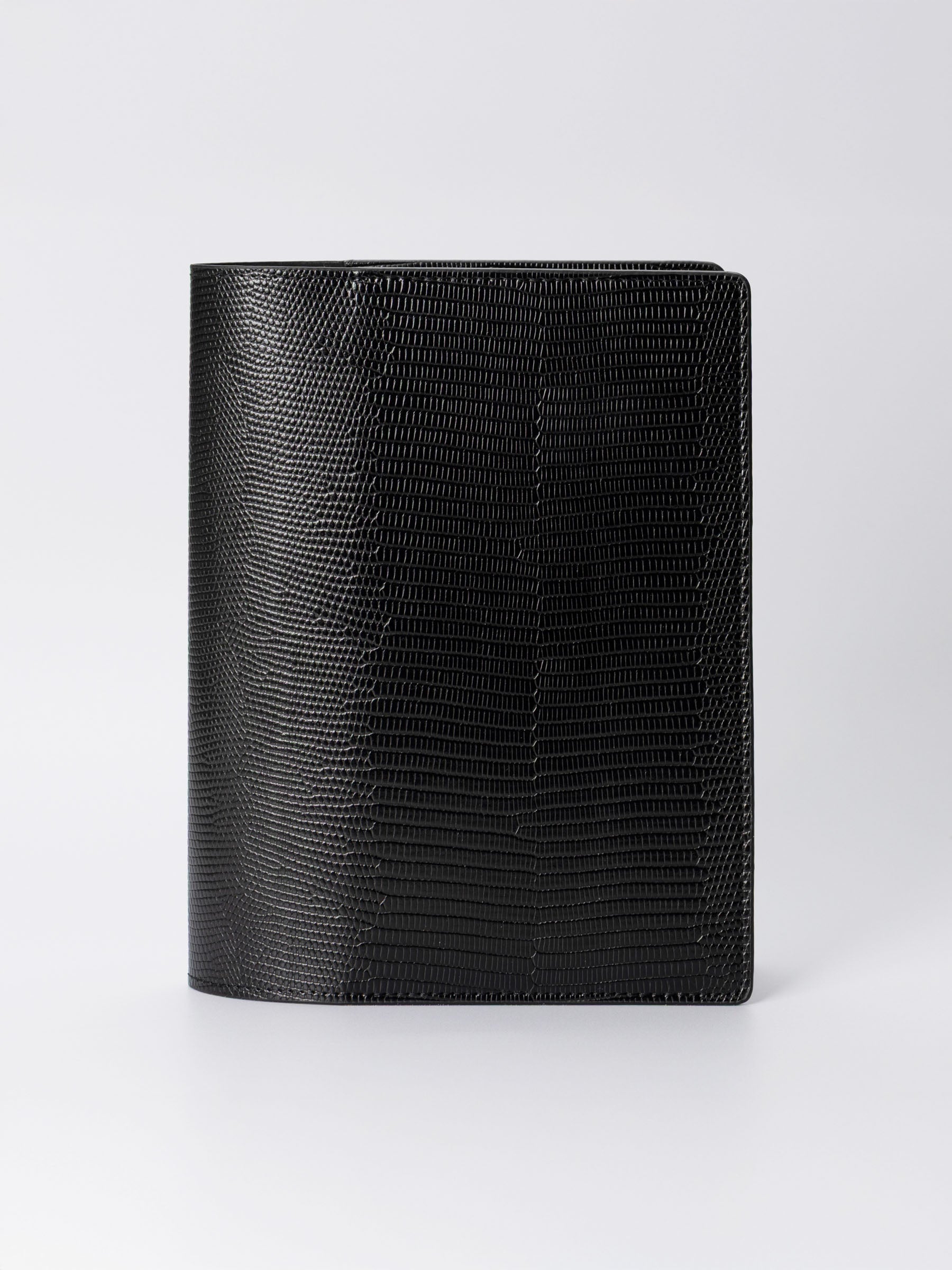 Folio displayed on a neutral background. Color shown is black. Size shown is Large.