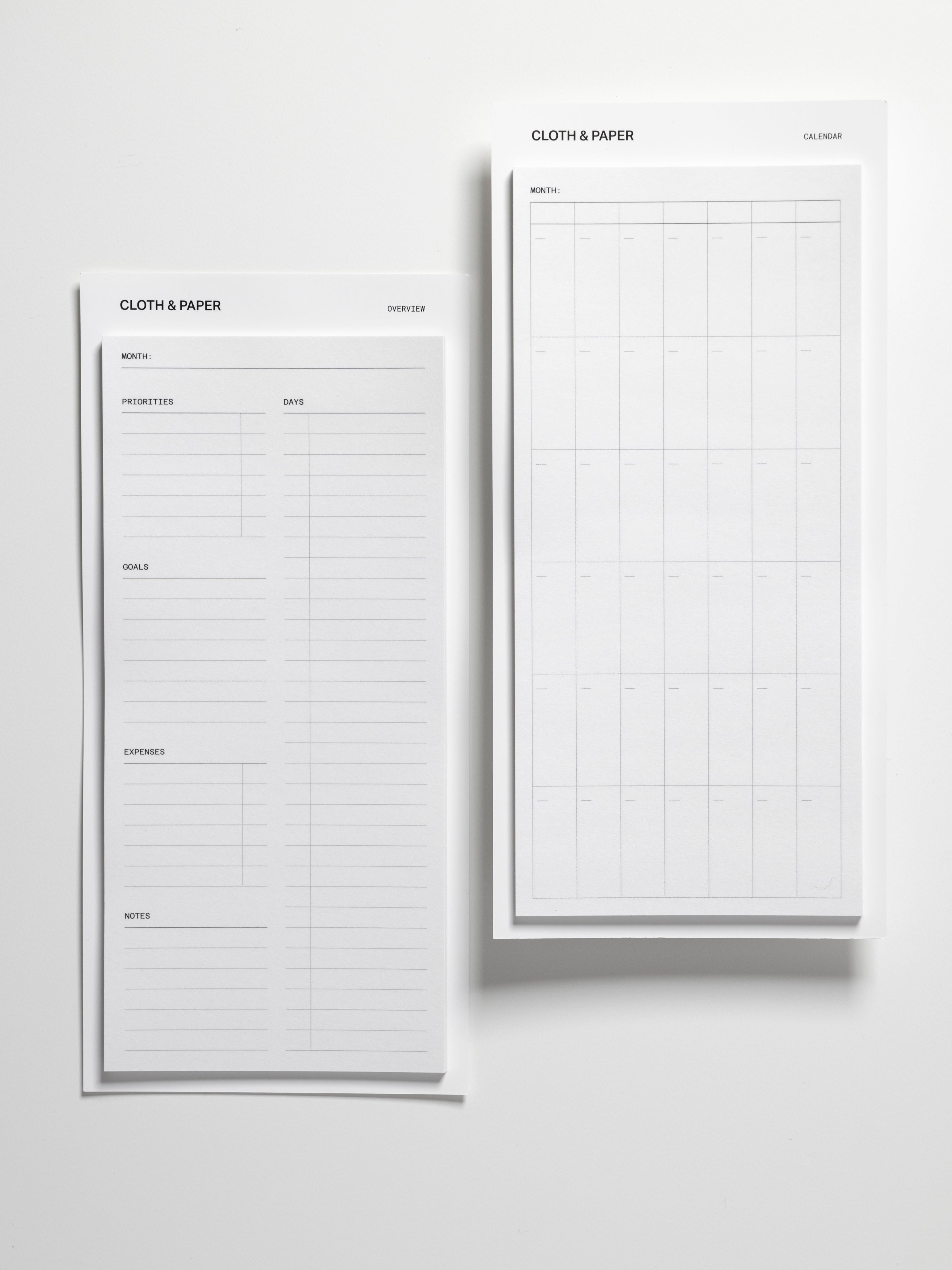 Calendar and Overview sticky note layouts side by side showing full-page monthly planning designs