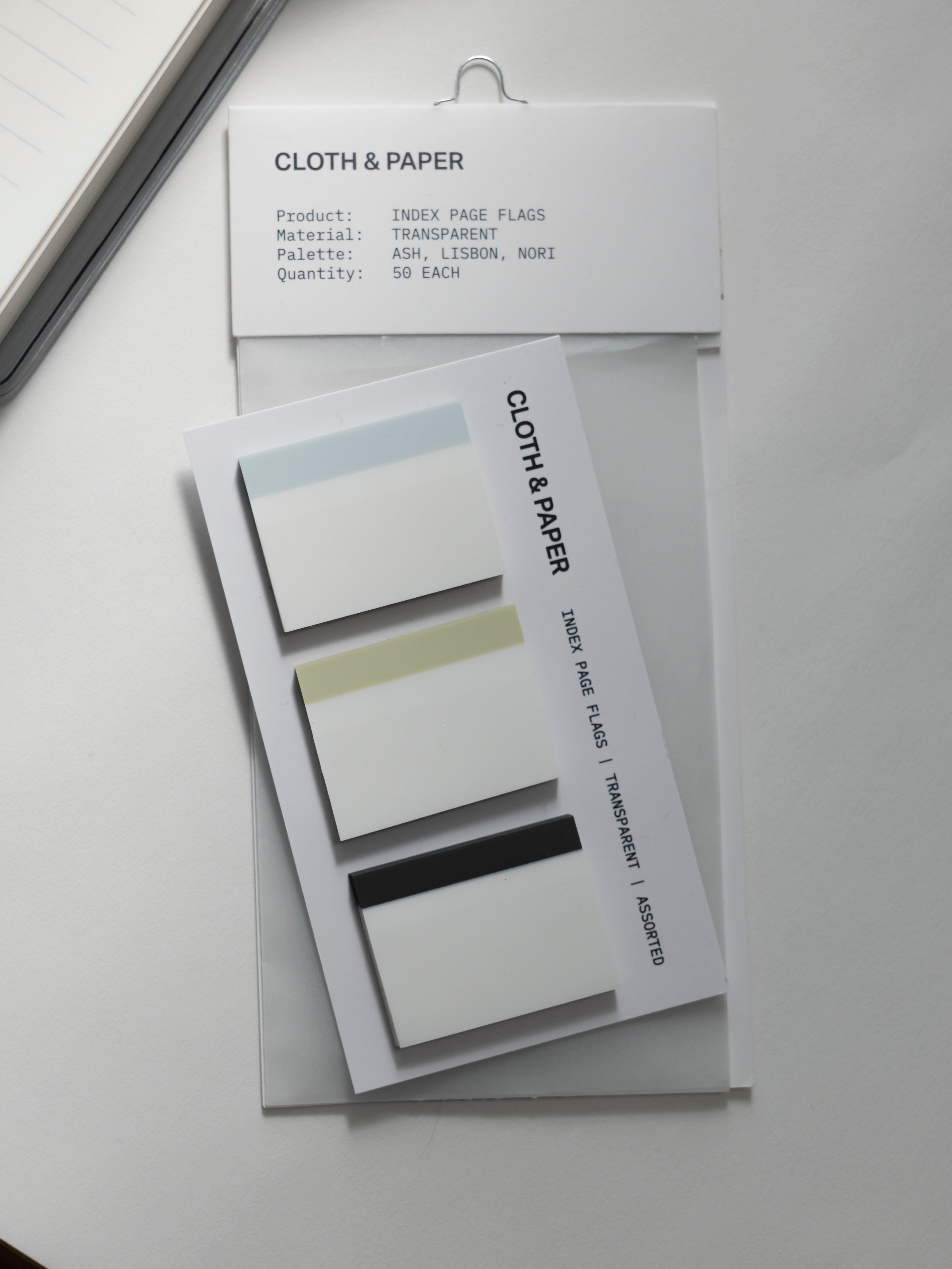 Index Page Flag Set in light blue, light green, and charcoal on a backing card