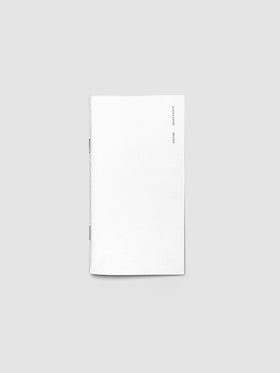 Release Paper Travel Notebook Insert shown in size Pocket Plus with white cover.