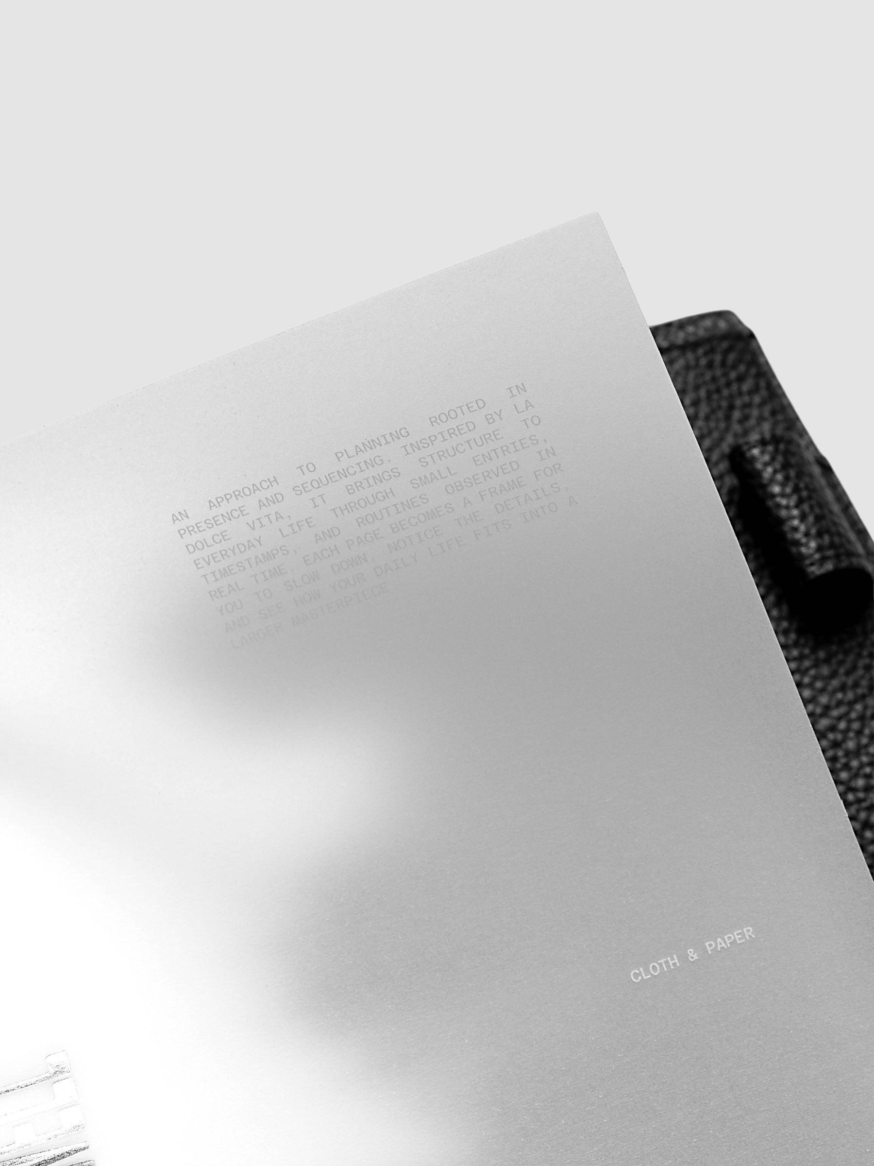 La Dolce Vita Dashboard Duo in A5 6-Ring Punch, a vellum overlay printed in white ink with silver foil layered over a soft gray gradient cardstock base on a light gray background