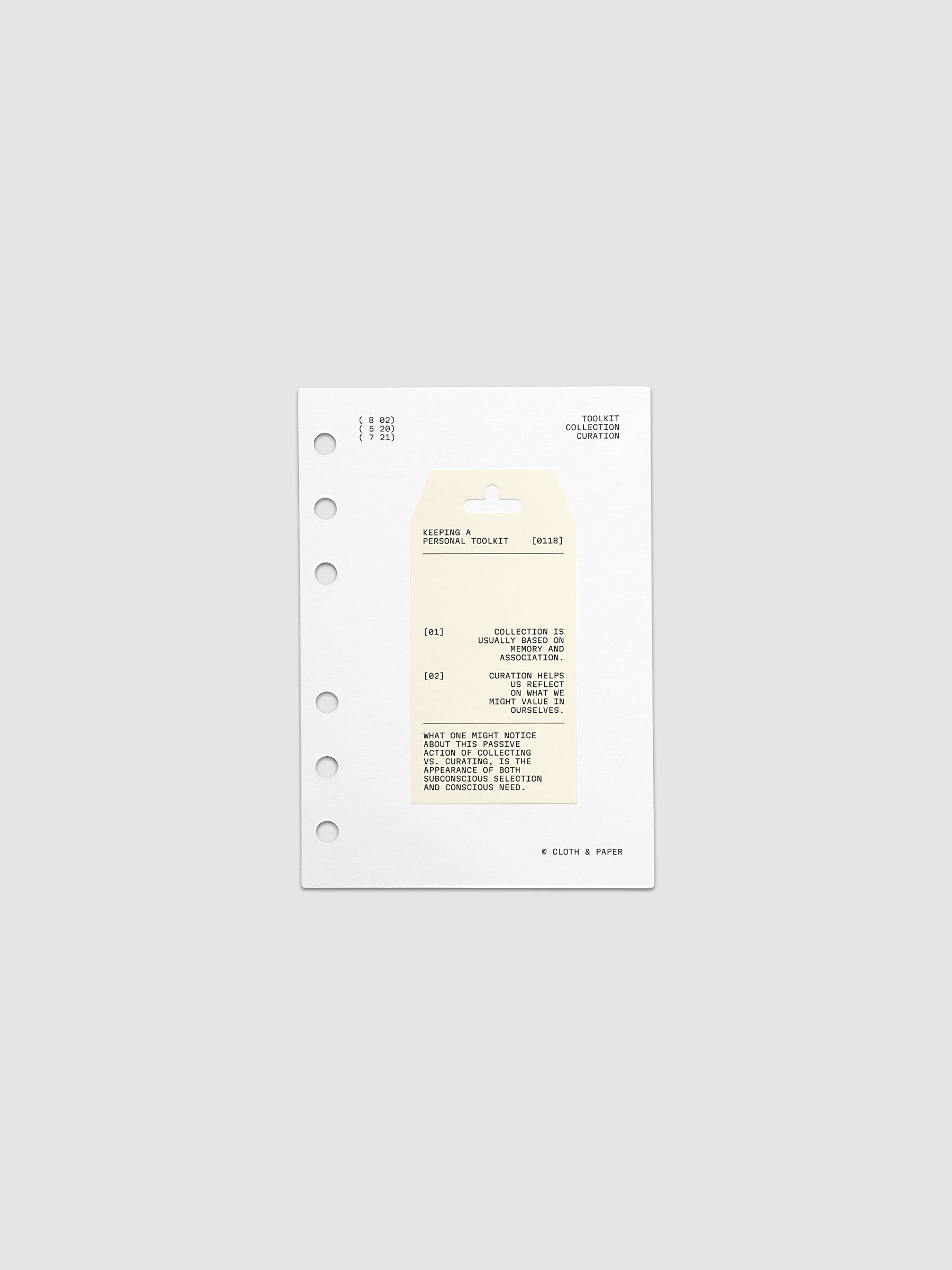 Personal Toolkit Planner Dashboard in A6 6-Ring Punch, a cardstock dashboard with an affixed warm gray printed tag in black type on a light gray background