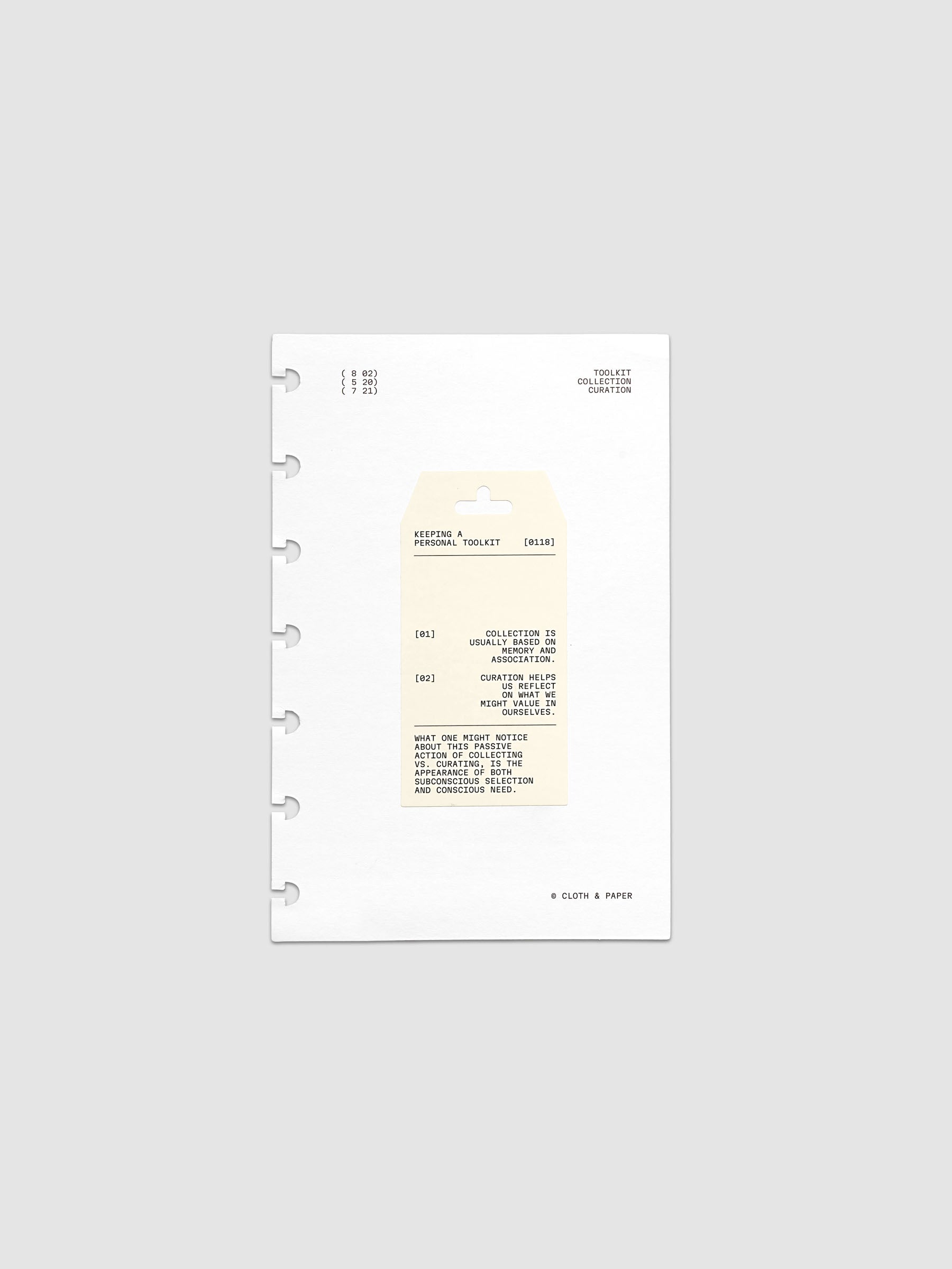 Personal Toolkit Planner Dashboard in HP Mini 7-Disc Punch, a cardstock dashboard with an affixed warm gray printed tag in black type on a light gray background