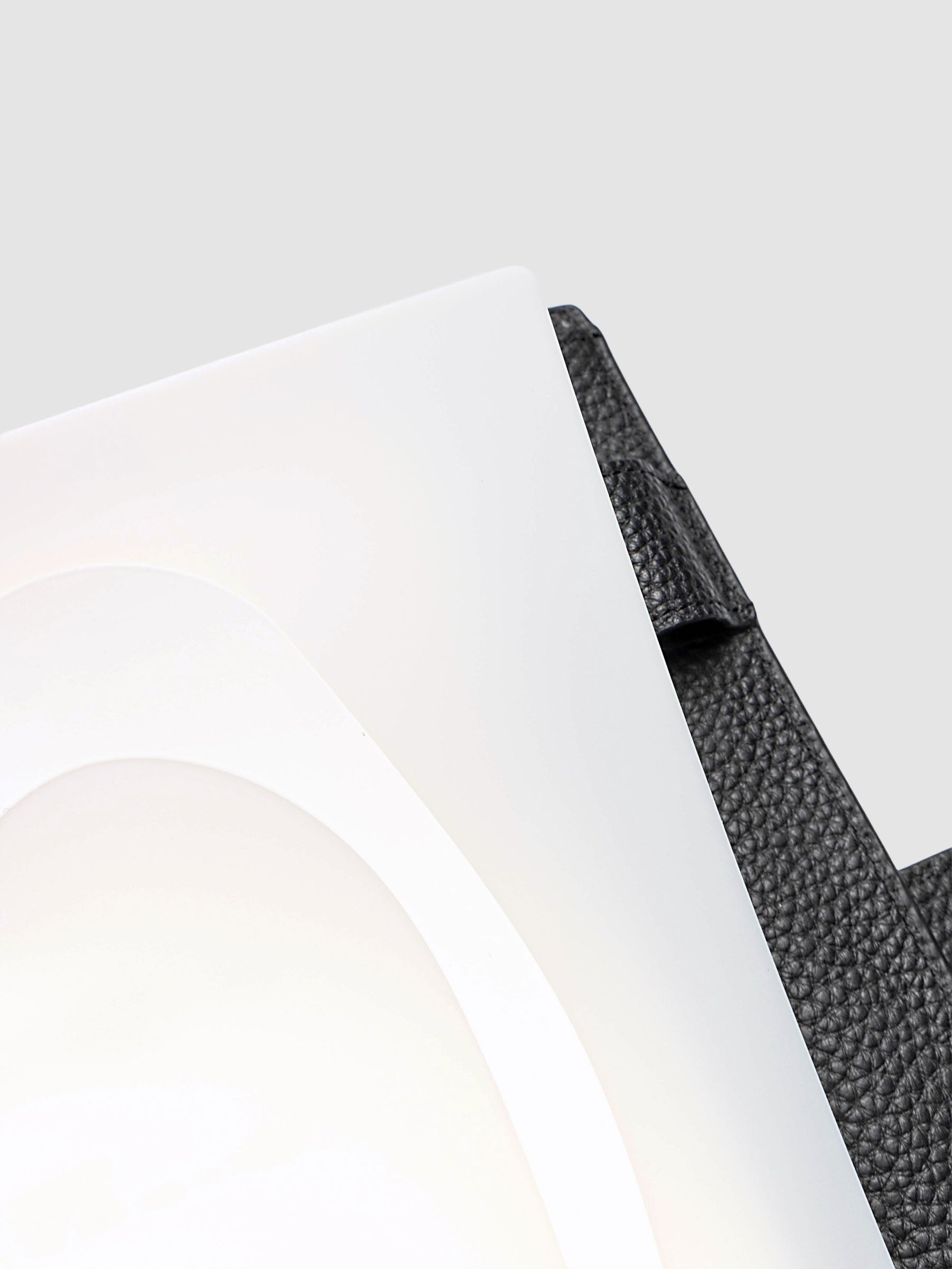 Continuation Planner Cover + Dashboard Set in A5 6-Ring Punch. Milky white frosted plastic cover with a spot gloss organic shape over a black-printed paper dashboard. Image 4 of 5.