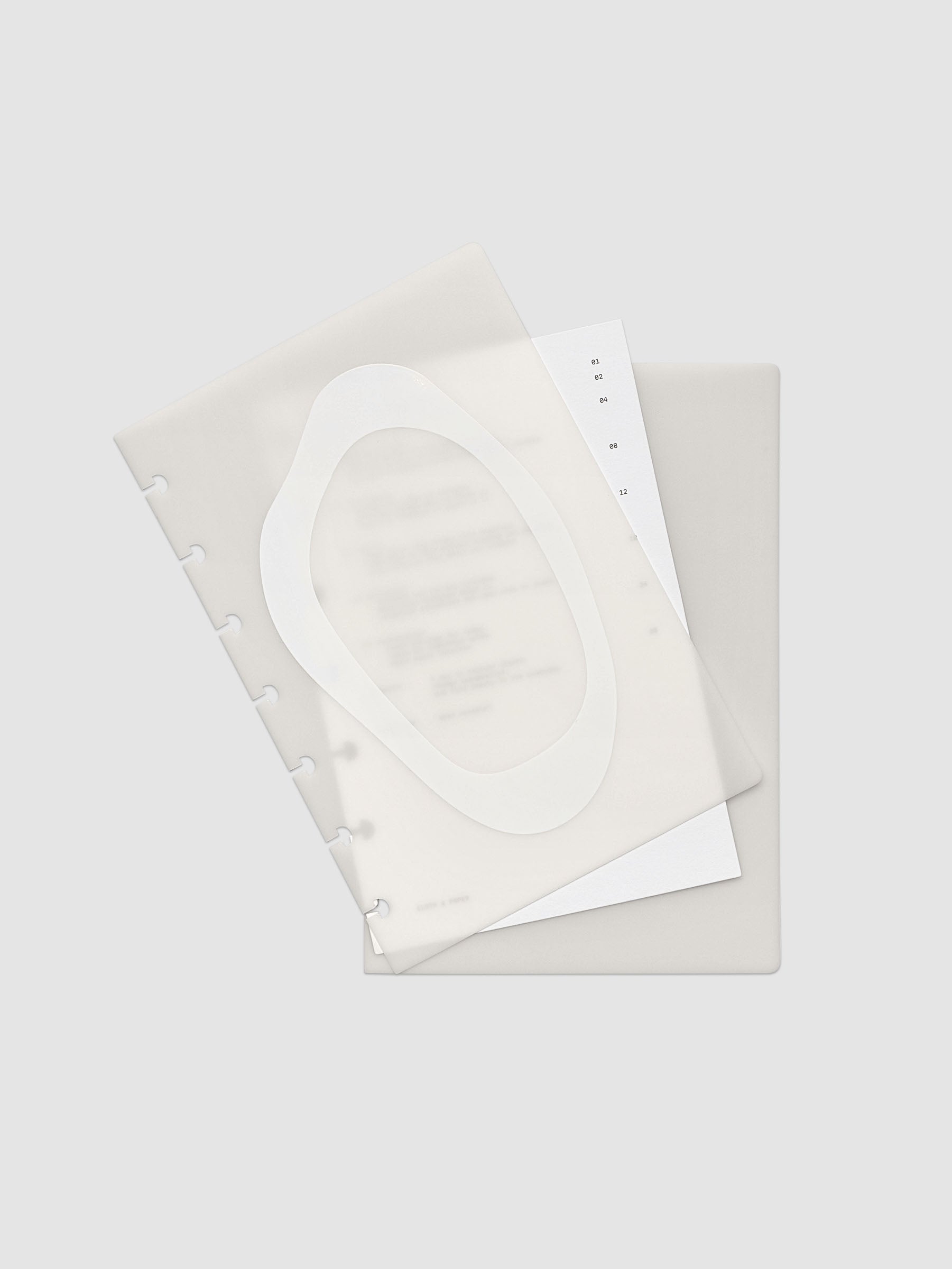 Continuation Planner Cover + Dashboard Set in HP Mini. Milky white frosted plastic cover with a spot gloss organic shape over a black-printed paper dashboard. Image 2 of 3.