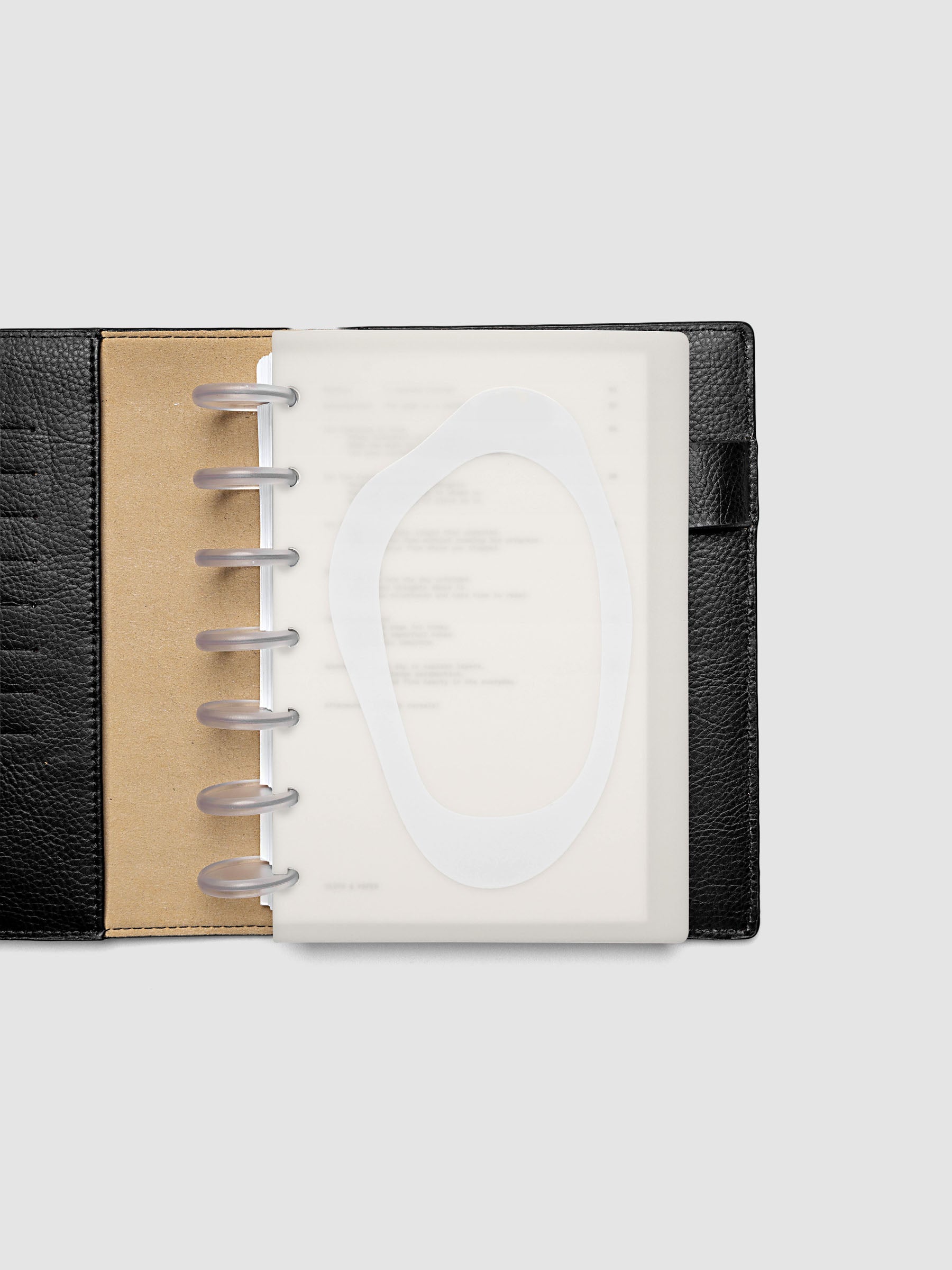 Continuation Planner Cover + Dashboard Set in HP Mini. Milky white frosted plastic cover with a spot gloss organic shape over a black-printed paper dashboard. Image 3 of 3.